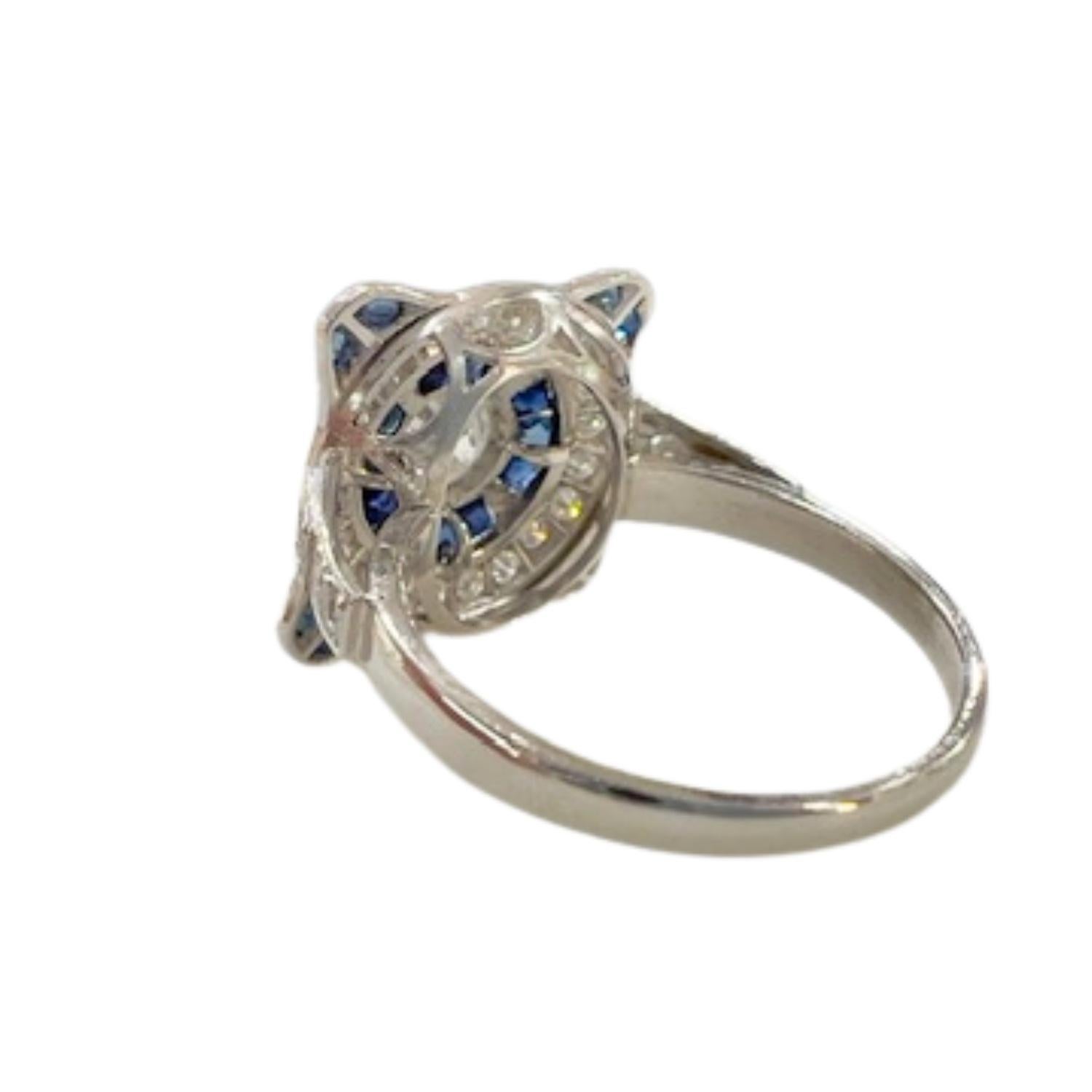 Donna Anello in stile Art Deco con diamanti da 0,88 carati e zaffiri taglio pera in platino in vendita