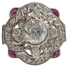 Vintage Art Deco Style with Central Diamond and Rubies Platinum Ring