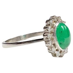 Antique Art Deco Style with Diamonds and Emerald Rosette Platinum Ring