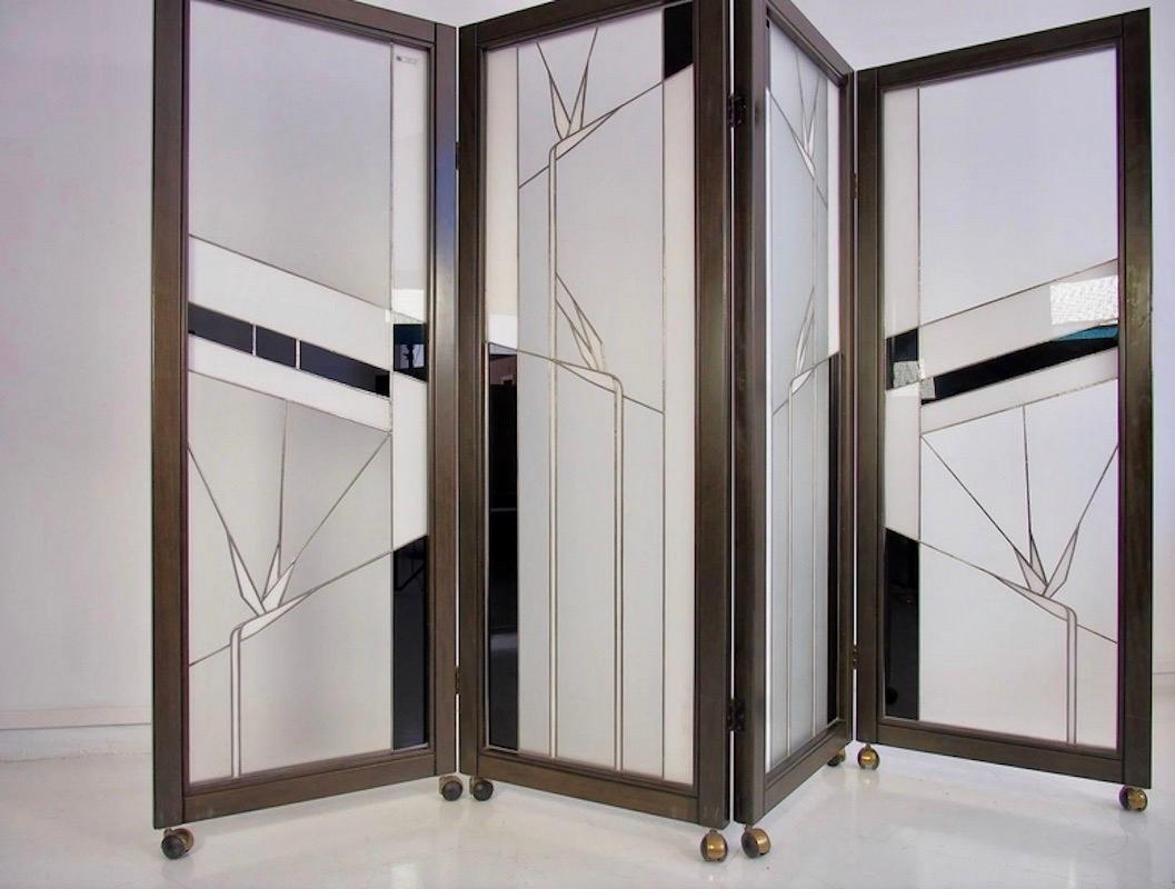 Beautiful Art Deco style wooden folding screen / room divider made with leaded glass and with ornaments shaped as birds of paradise. Produced in Verona, Italy by Poliarte in the 1970s. The screen has brass wheels to move it around the room easily. 
