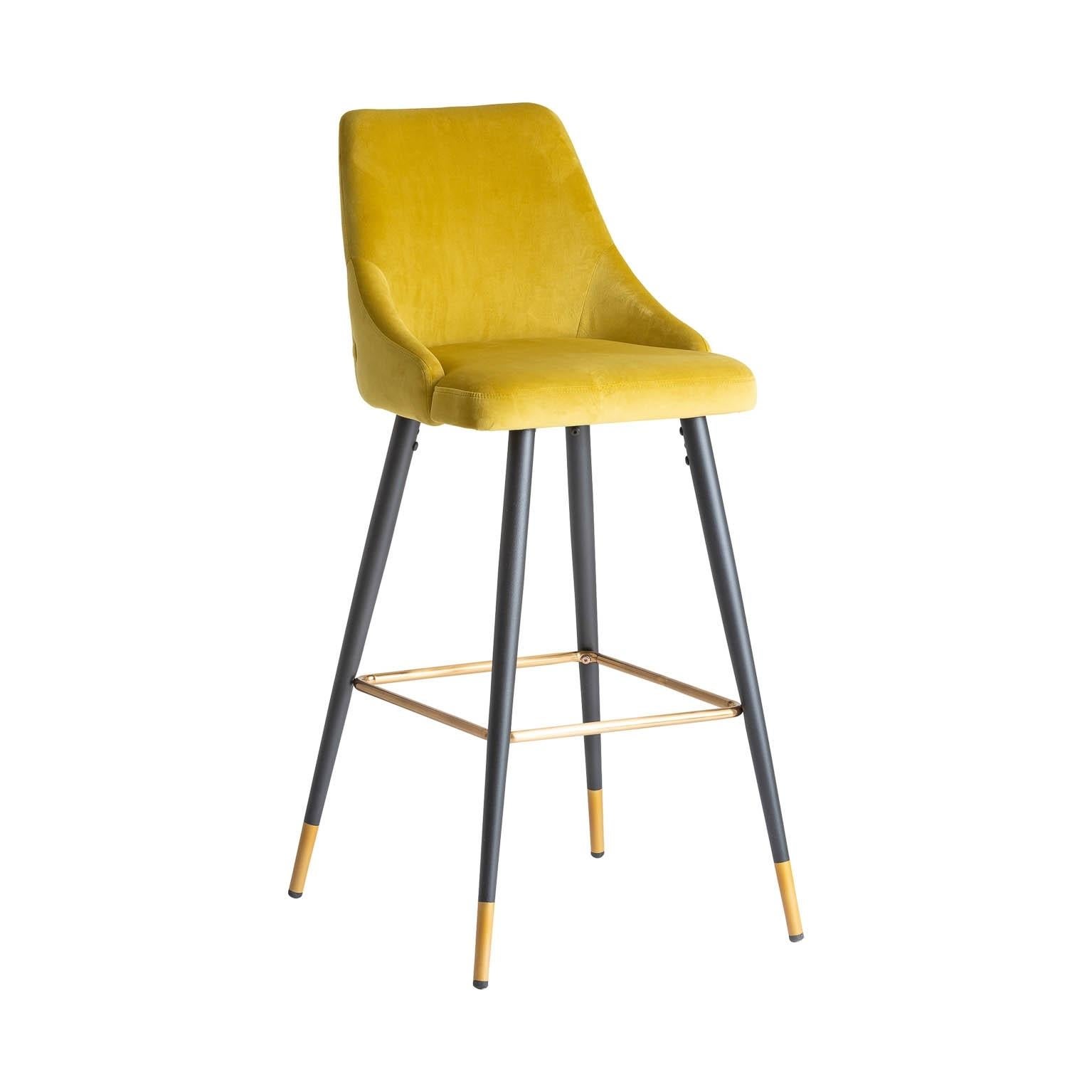 Art Deco style bar stool with a black laquered metal feet with gilded metal finish and a comfortable mustard velvet seat padded back. Elegant, aerial and poetic.