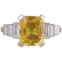 Art Deco Style Yellow Sapphire Ring with Baguette Diamond Shoulders in Platinum