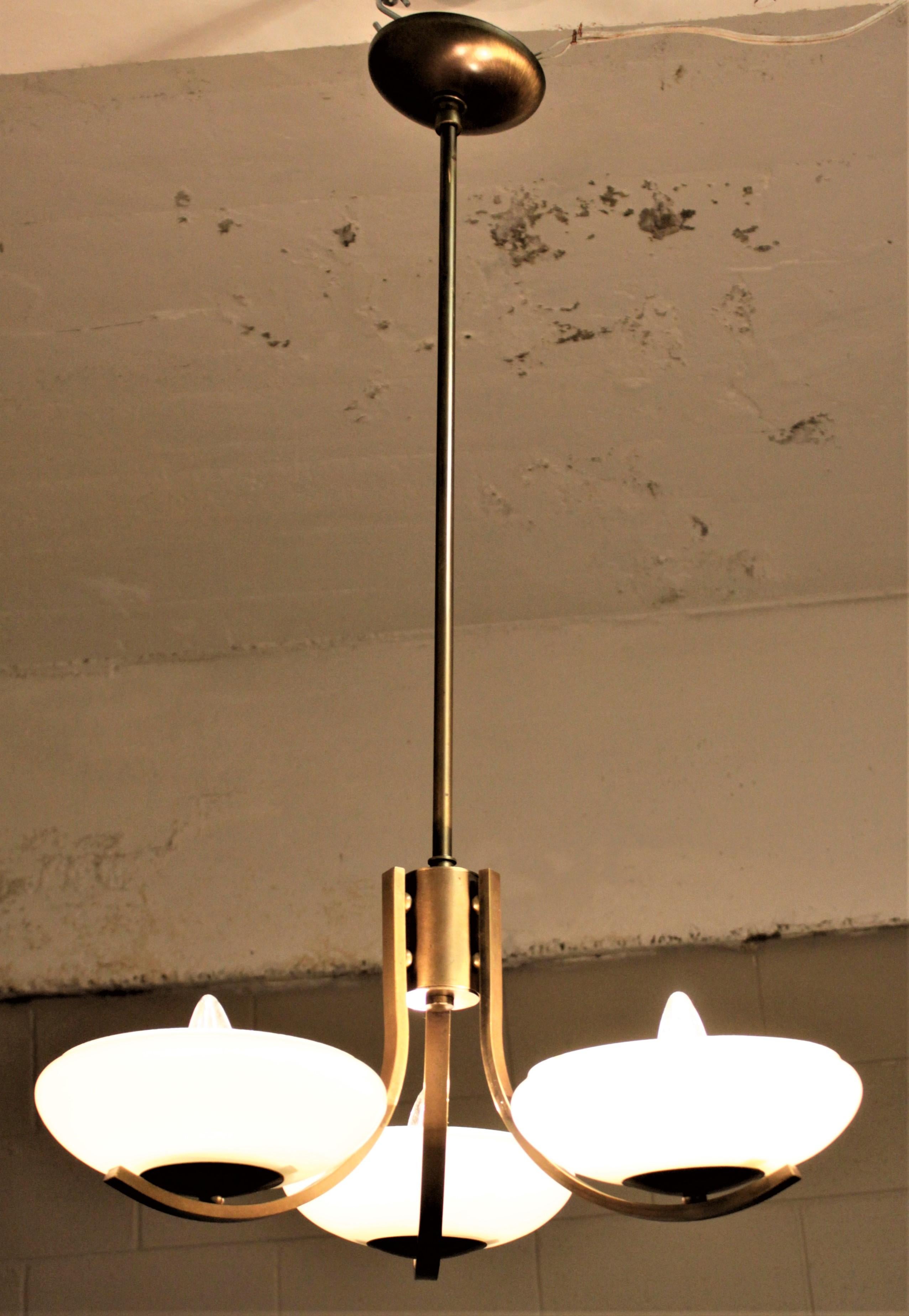 Machine-Made Art Deco Styled Brass Three Branch Chandelier with Off-White Glass Cupped Shades