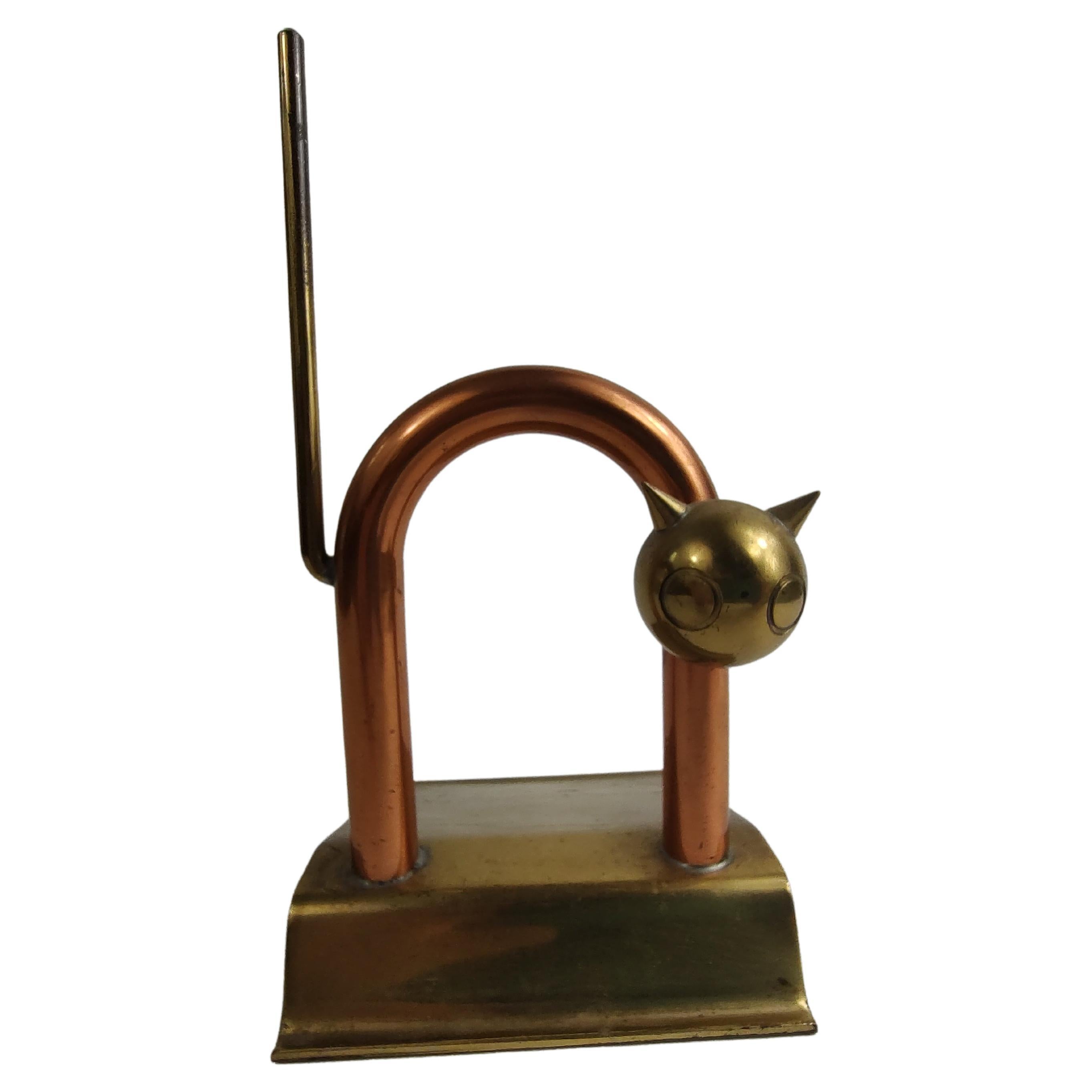 Fabulous simple yet elegant design by Walter Von Neesen for Chase circa 1935. Brass & copper stylized in the form of a arching cat. Rare find. In excellent vintage condition with minimal wear.