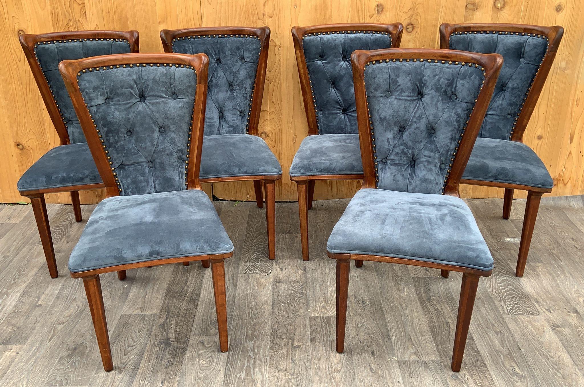 Vintage Italian Art Deco Sculptural Curved Back Dining Chairs Newly Upholstered in a Holly Hunt Blue Suede - Set of 6

The Vintage Italian Art Deco Sculptural Curved Back Dining Chairs, newly upholstered in Holly Hunt Blue Suede, form a stunning and