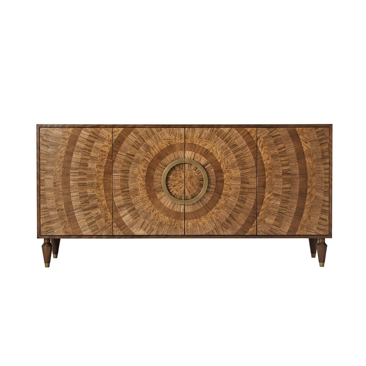 With a veneered case with specimen parquetry sunburst inlaid front motif inlaid on the four-door front. With open work circle brass finish handle. The interior is fitted with adjustable shelves and the case is raised on four turned and tapered