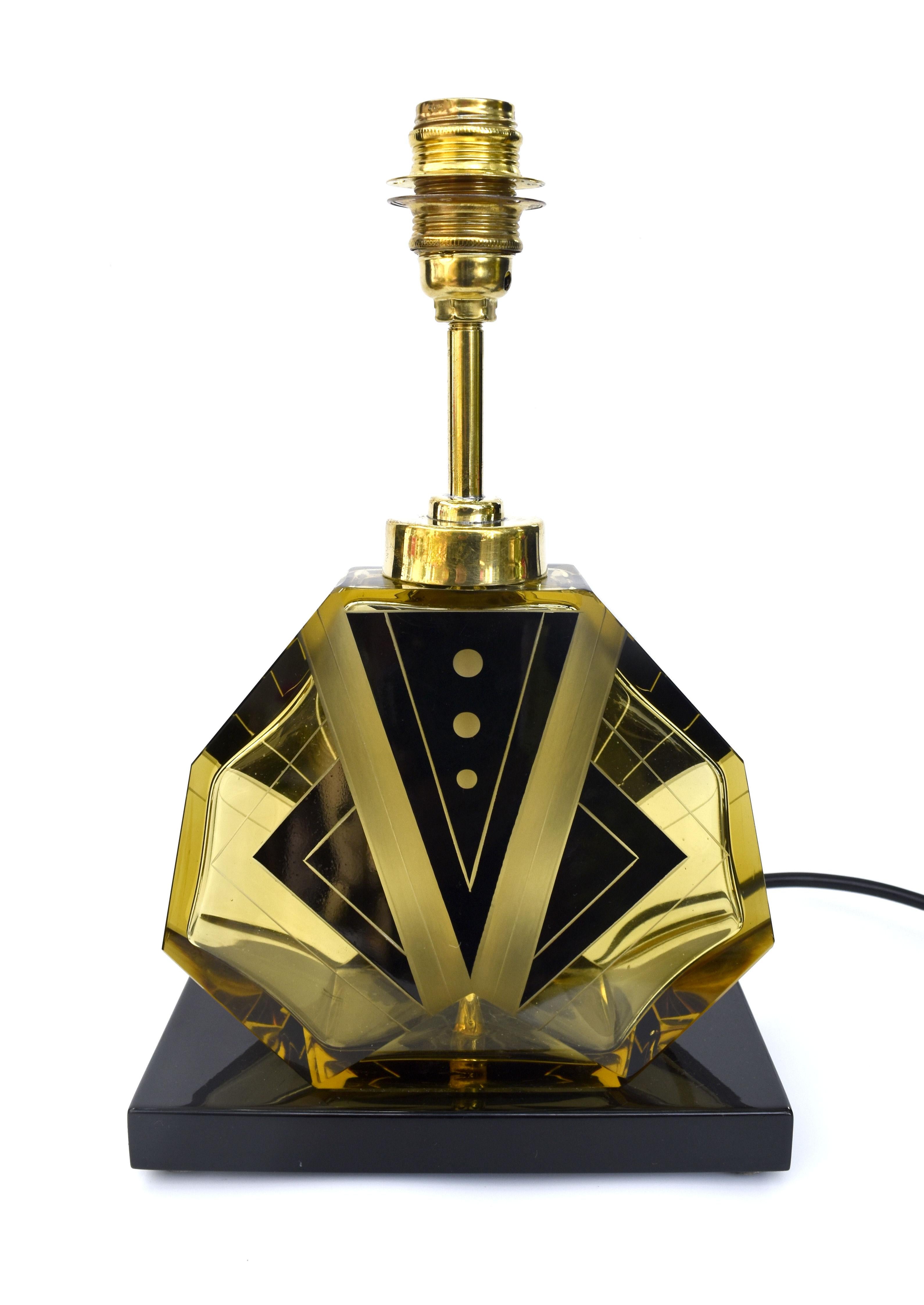 For your consideration is this fabulously iconic looking Art Deco table lamp by Karl Palda. The body of the lamp is actually a decanter that had a damaged neck and has been cleverly converted to a table lamp. We've added a shade which you can choose