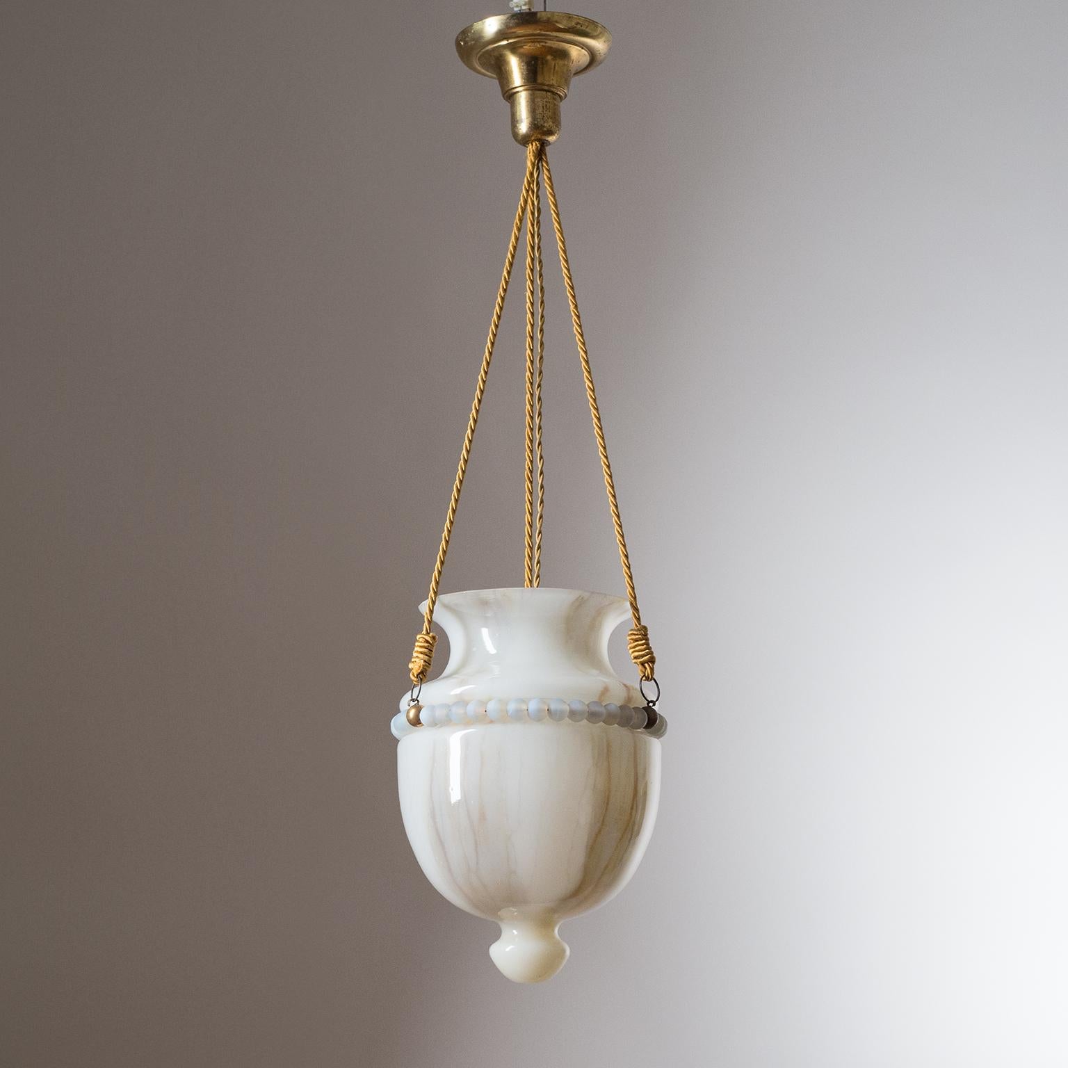 Rare neoclassical Art Deco lantern, circa 1930, with an urn-shaped, hand painted marbled glass body. Suspended by three twisted cords which attach to a ring of large glass beads. The urn- or bell-shaped glass body has a marbled effect which was hand