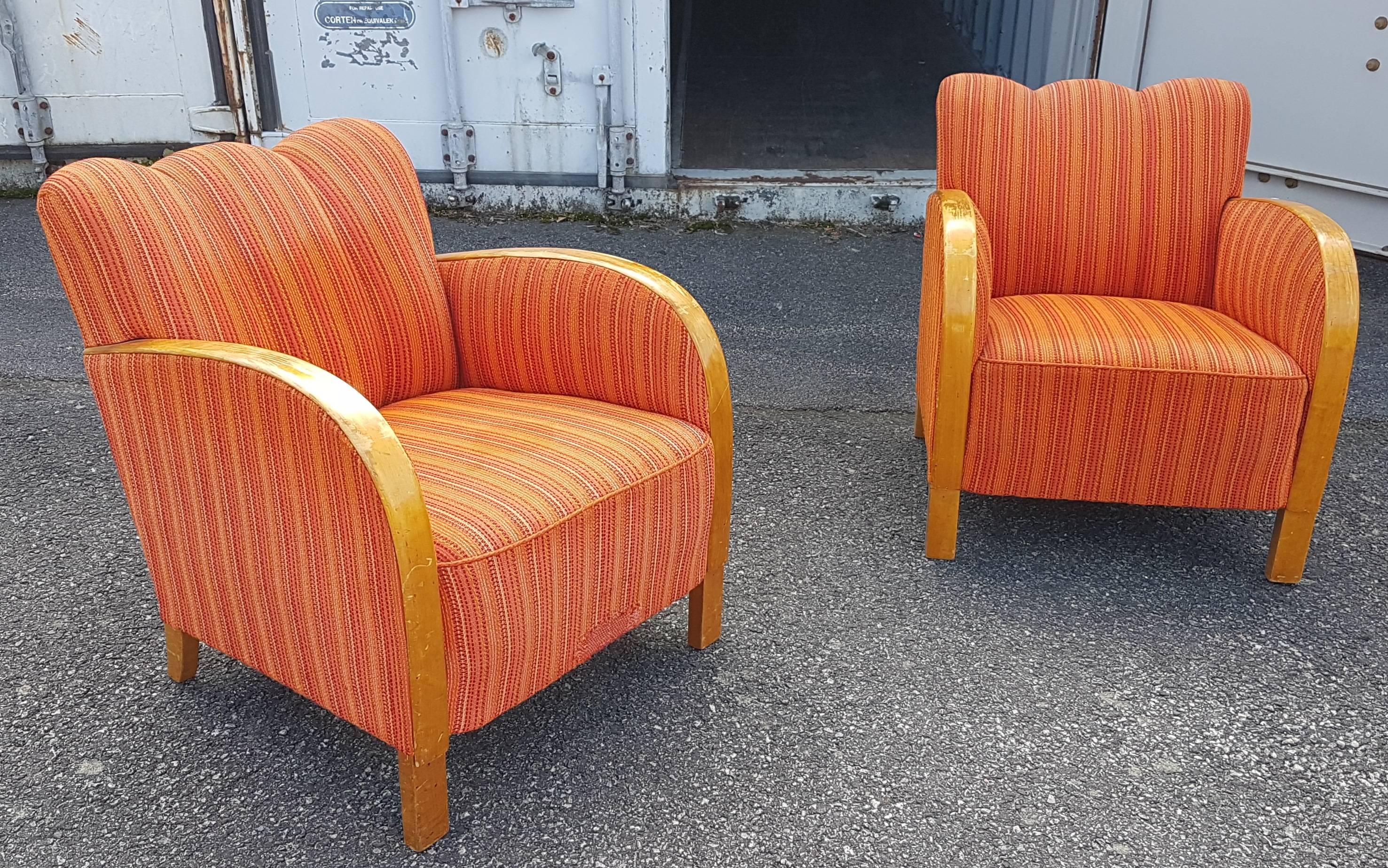 This is a Classic pair of original Swedish Art Deco armchairs with golden birch bentwood arms in a rich honey color French polish finish. They have the rare fluted back which are hard to find.

The extra deep fully sprung seats on these armchairs