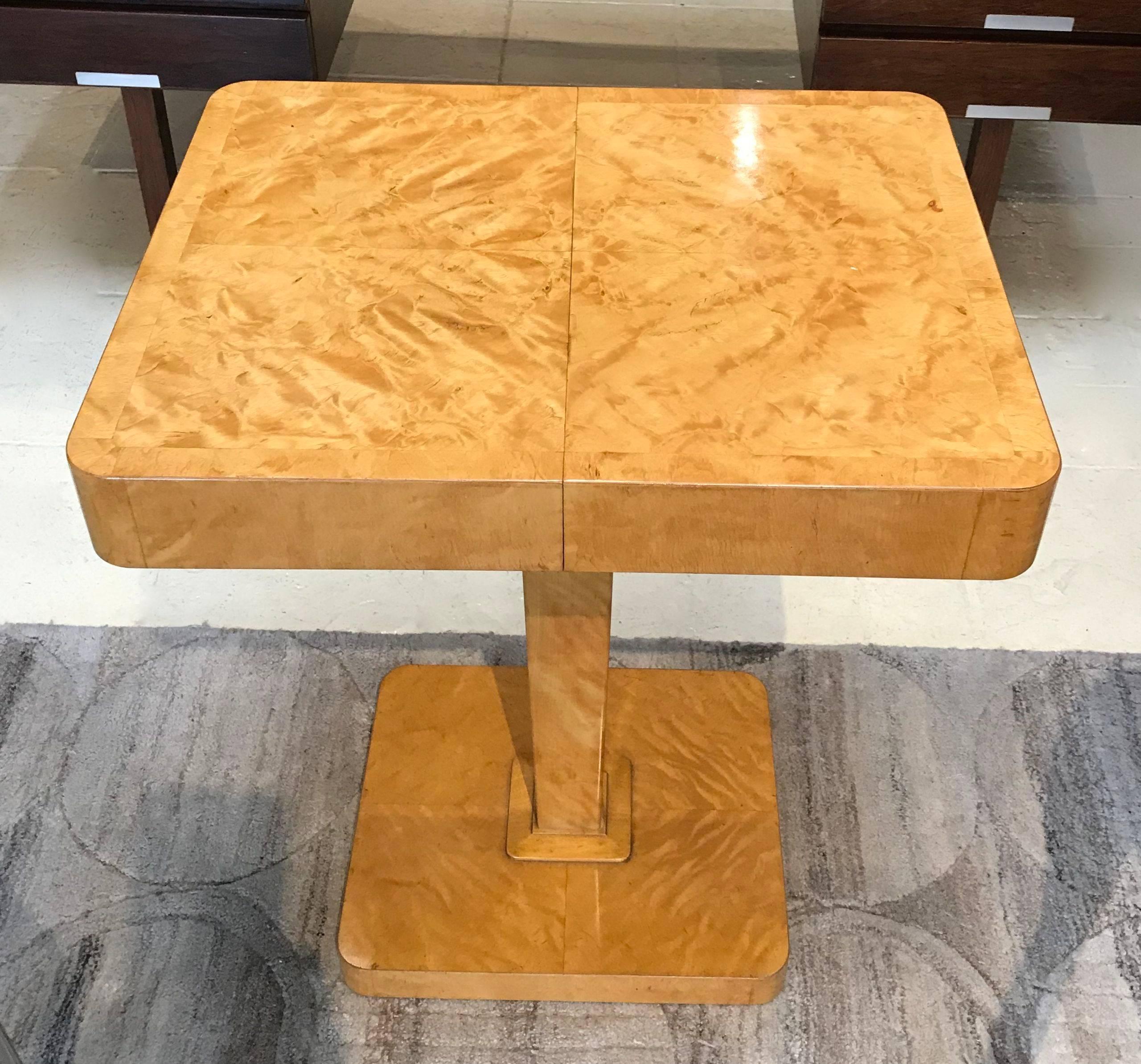 Flame birch Art Deco sewing table with tapered pedestal base. Produced by 