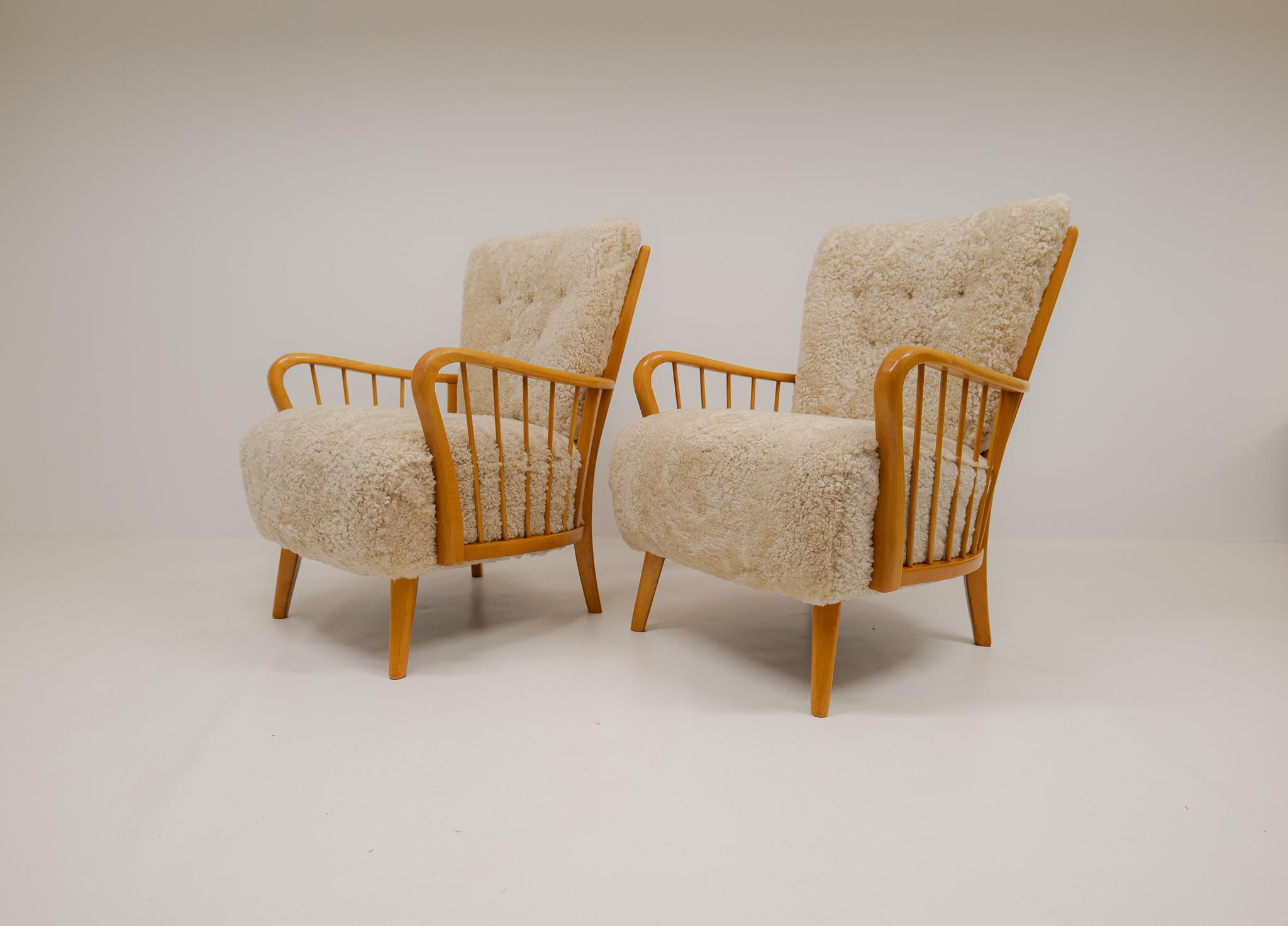 Art Deco Swedish Grace Lounge Chairs in Shearling / Sheepskin 1940s Sweden In Good Condition For Sale In Hillringsberg, SE