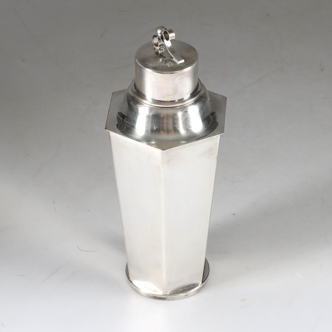 Silver plated cocktail Shaker designed in 1935, it has perfect functionalist lines and proportions and makes a striking decorative piece.
Very good condition with unpolished original patina, this will polish to bright shine, if desired.