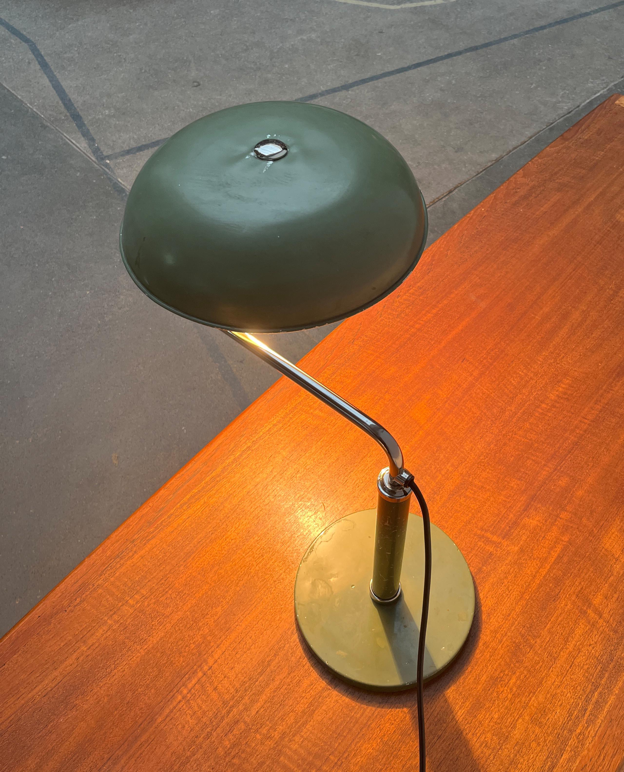 Rare table lamp from the swiss manufacturer amba based on a design by alfred müller from the 1930s. It was later produced by belmag.

a functional design classic from the early 20th century. The lamp still has the original color - a shade of green -