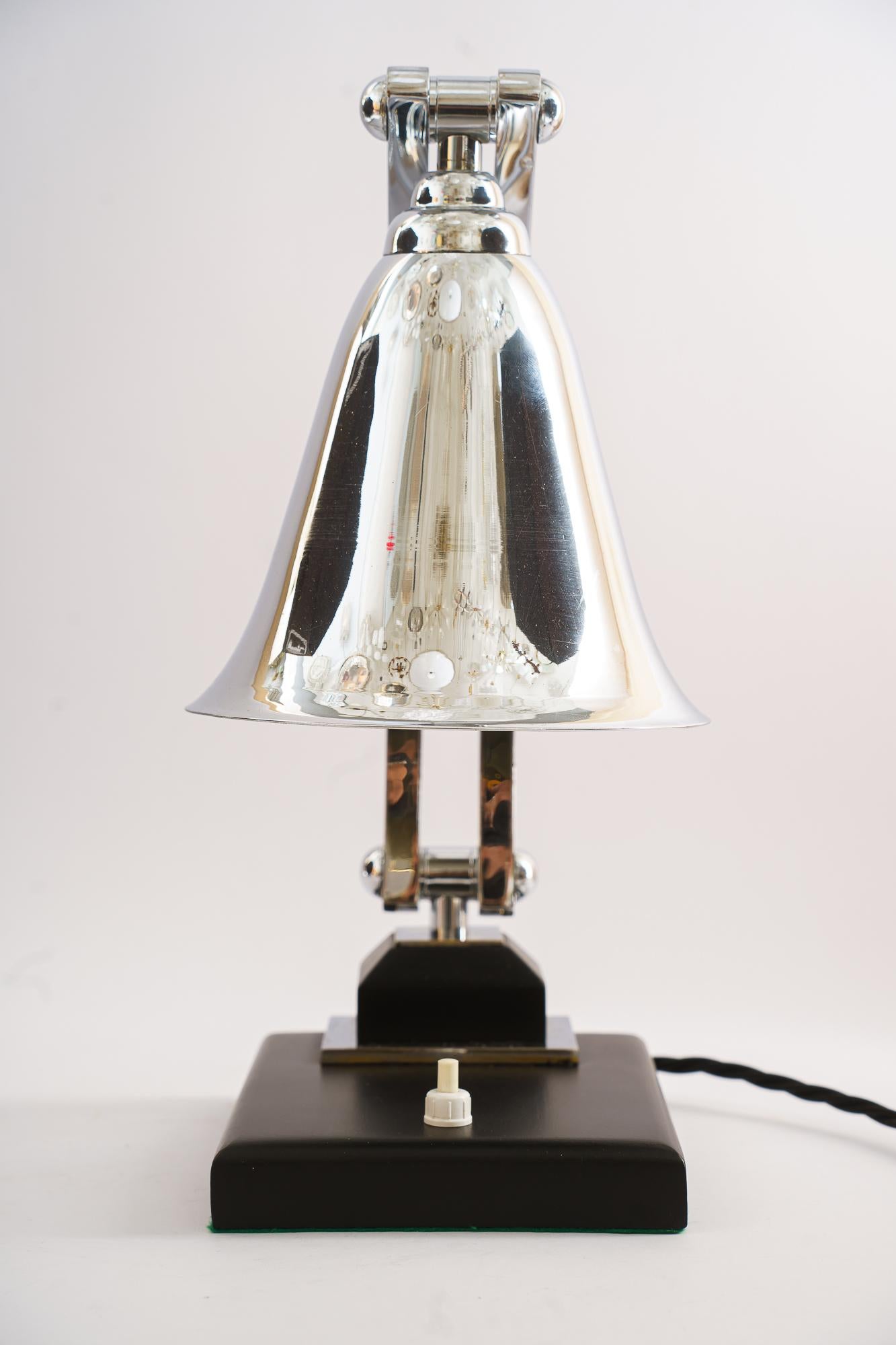 Art Deco swiveling chrome table lamp vienna around 1930s
Brass (Chromed) polished. 


