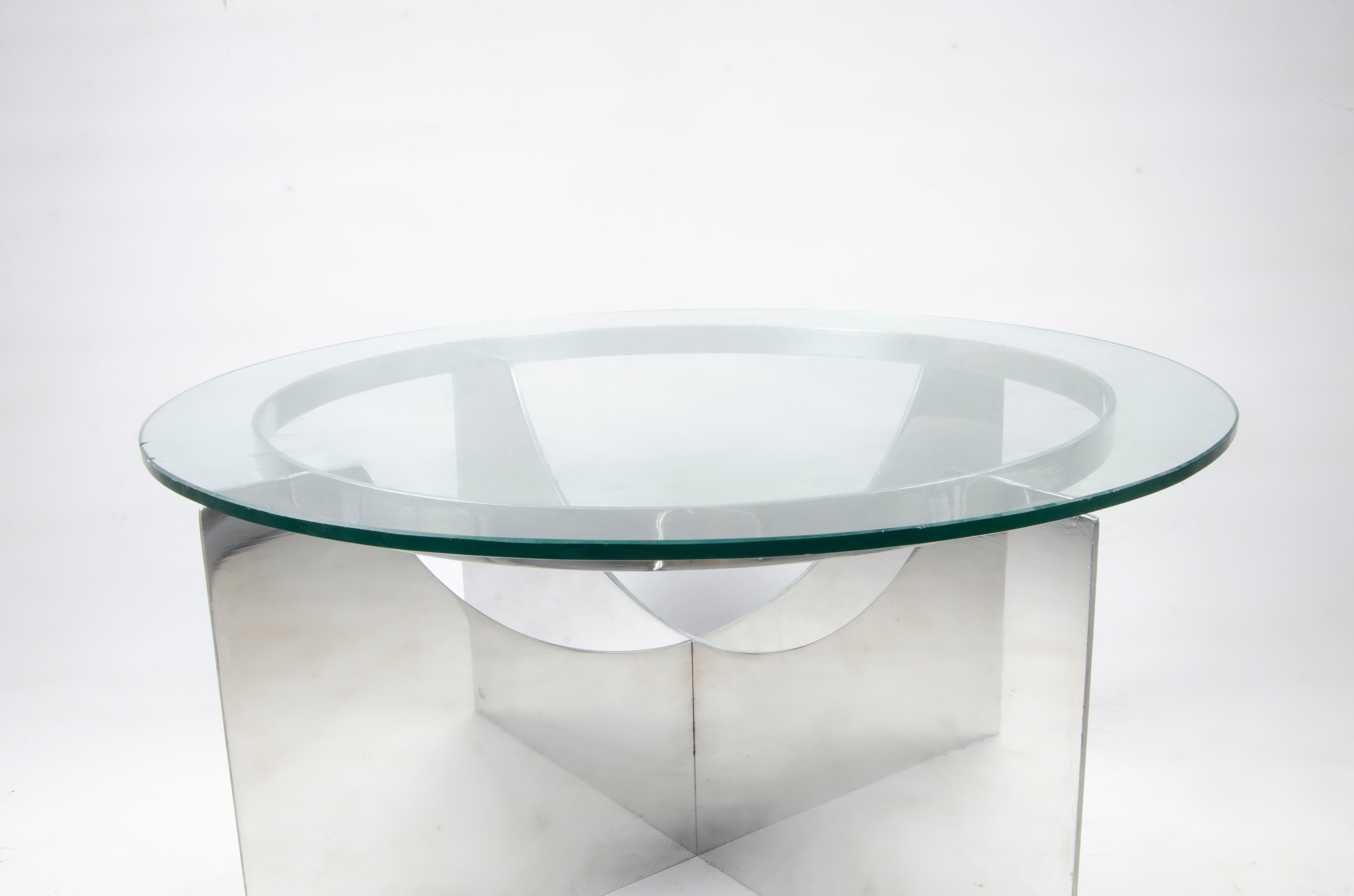 Cruciform table with a glass top. Imprinted with the Boris Jean Lacroix seal.

France, CIRCA 1930.