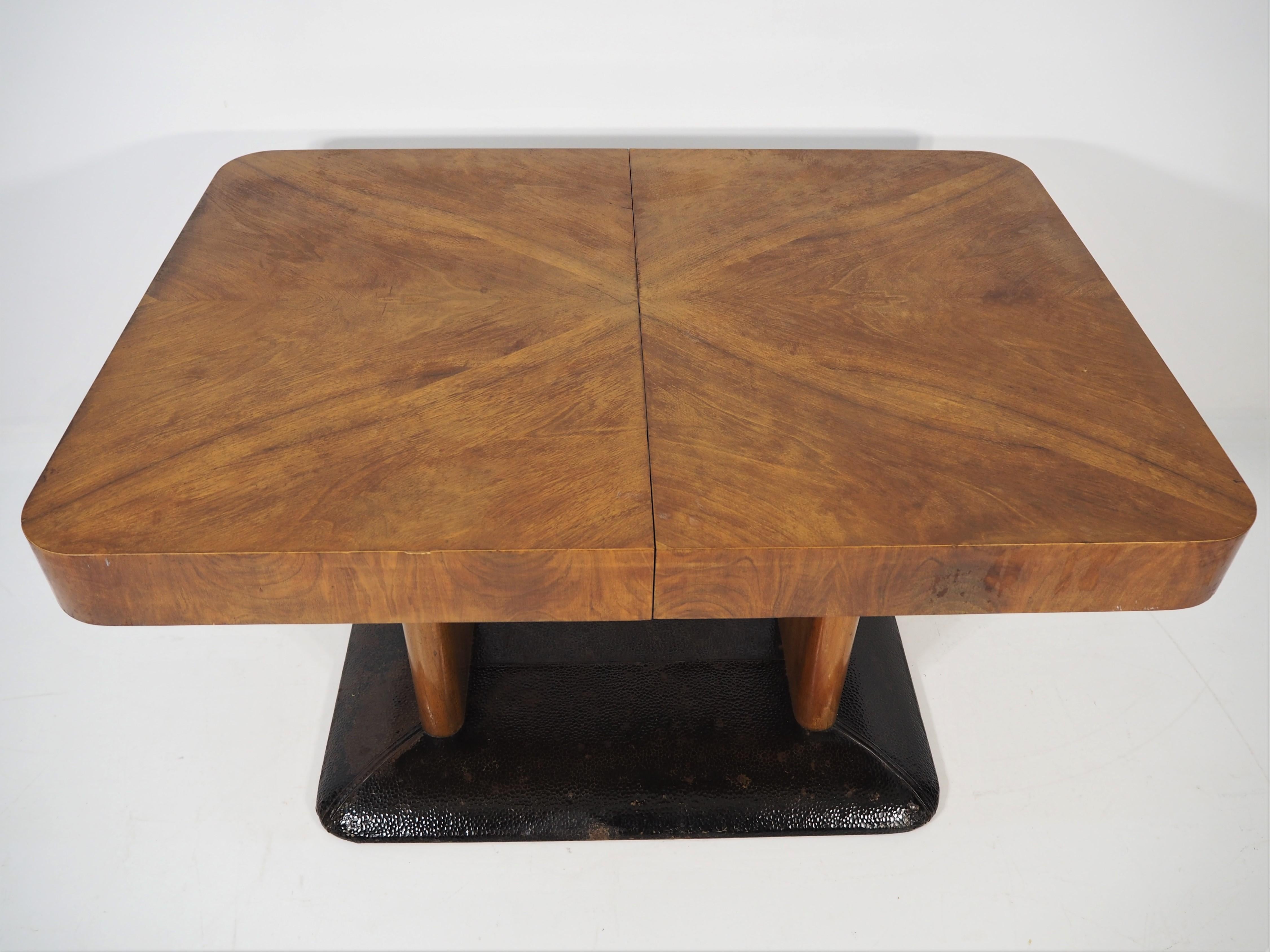 Art Deco walnut table. This table was designed and made in the circa 1940s in the former Czechoslovakia. The material is walnut veneer. Dimensions: Height 76 cm, length 120 cm, width 85 cm. Very good craftsmanship and fully functional. Unfolded