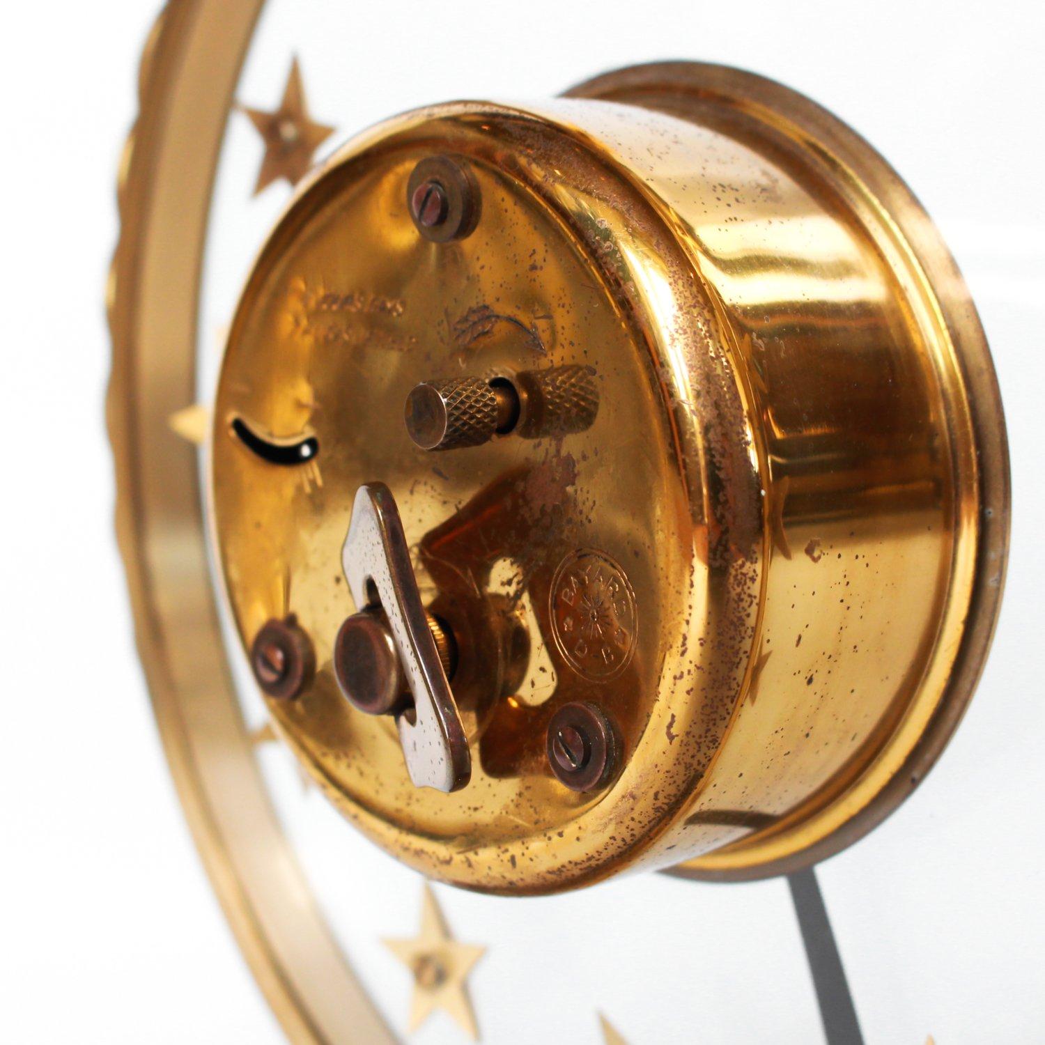 An Art Deco, brass, marble and glass clock by Bayard. 

Original mechanism with eight day movement. In good working order.

Dimensions: H 22cm, W 19cm, D 5.5 cm

Origin: French

Date: circa 1930.

  