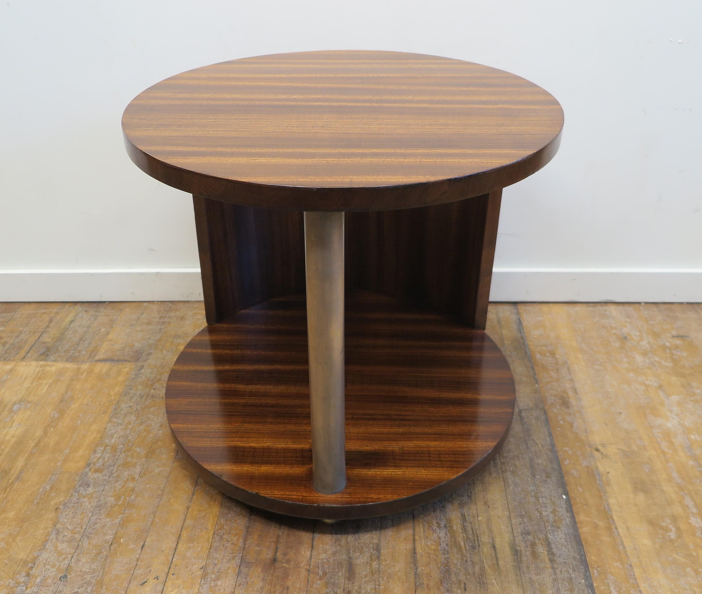 French Modernist Art Deco side table attributed to Etienne Kohlmann in rosewood with nickeled bronze Colum and demi lune plate over rear leg. Period French Art Deco rosewood circular table with metal column circa 1935. In very good condition.
