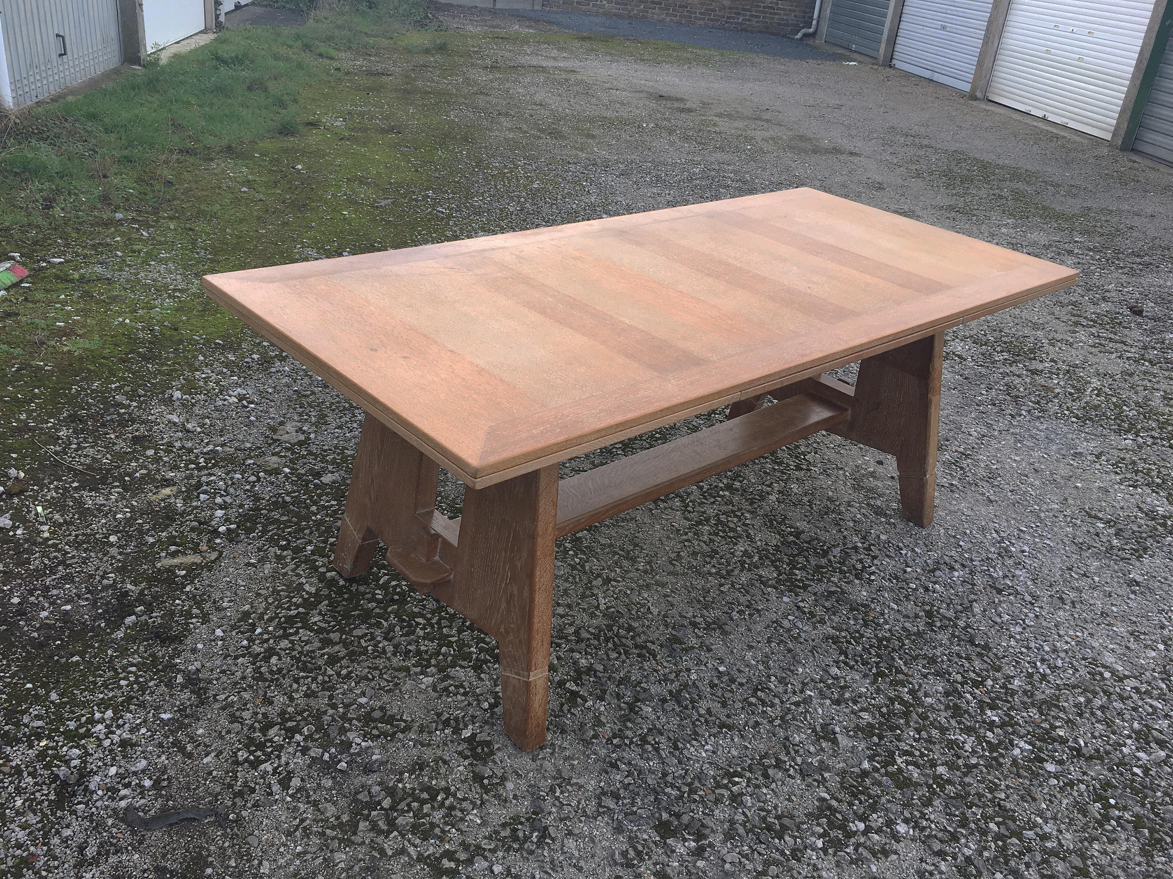 Art Deco table in oak in the style of Charles Dudouyt, circa 1940.
Dimension with 2 extensions: 75 x 320 x 90 cm.