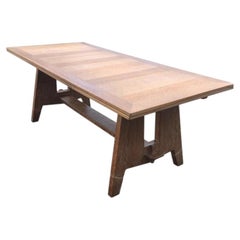Art Deco table in oak in the style of Charles Dudouyt, circa 1940.