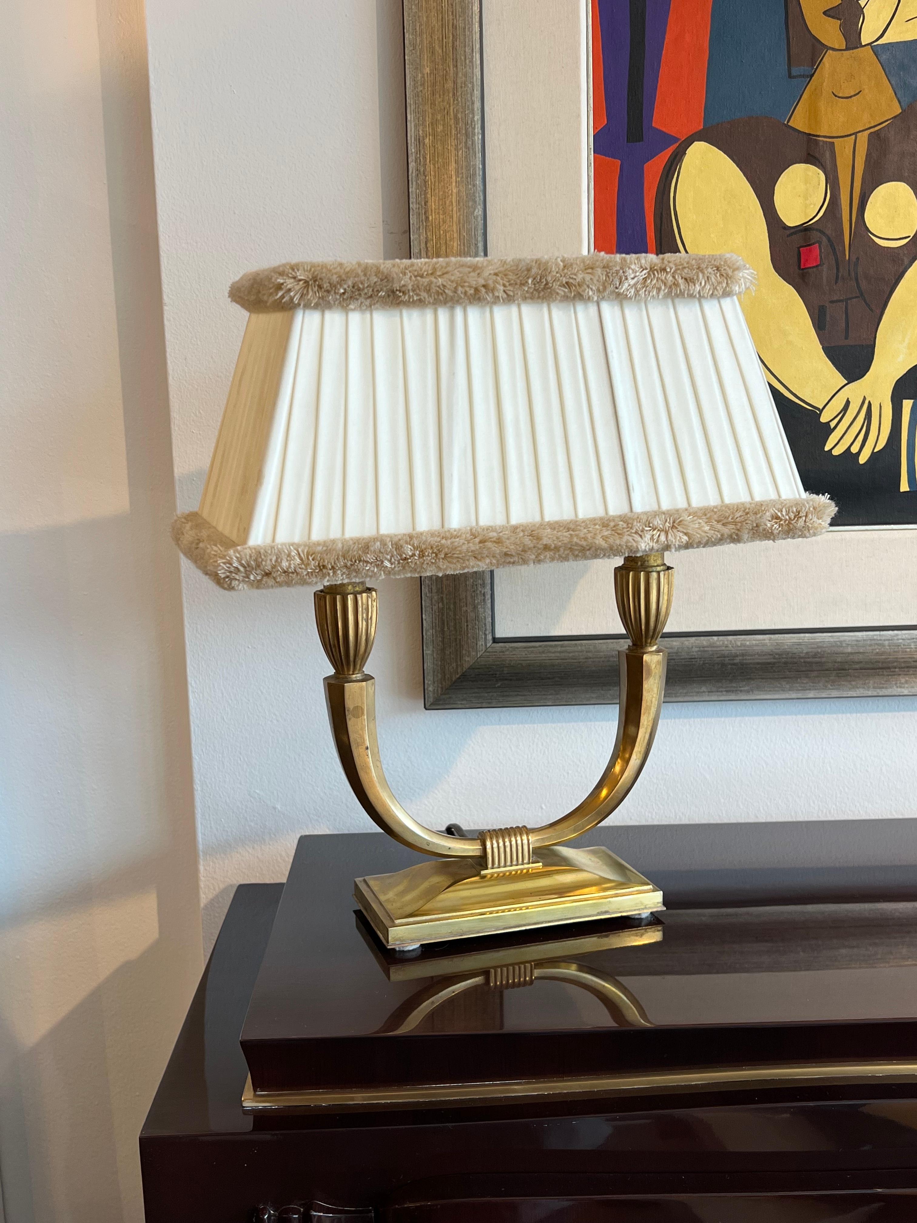 A Beautiful French Art Deco table lamp in Bronze with Silk Shade. designed by Dominique Paris
Made in France
Circa: 1925.