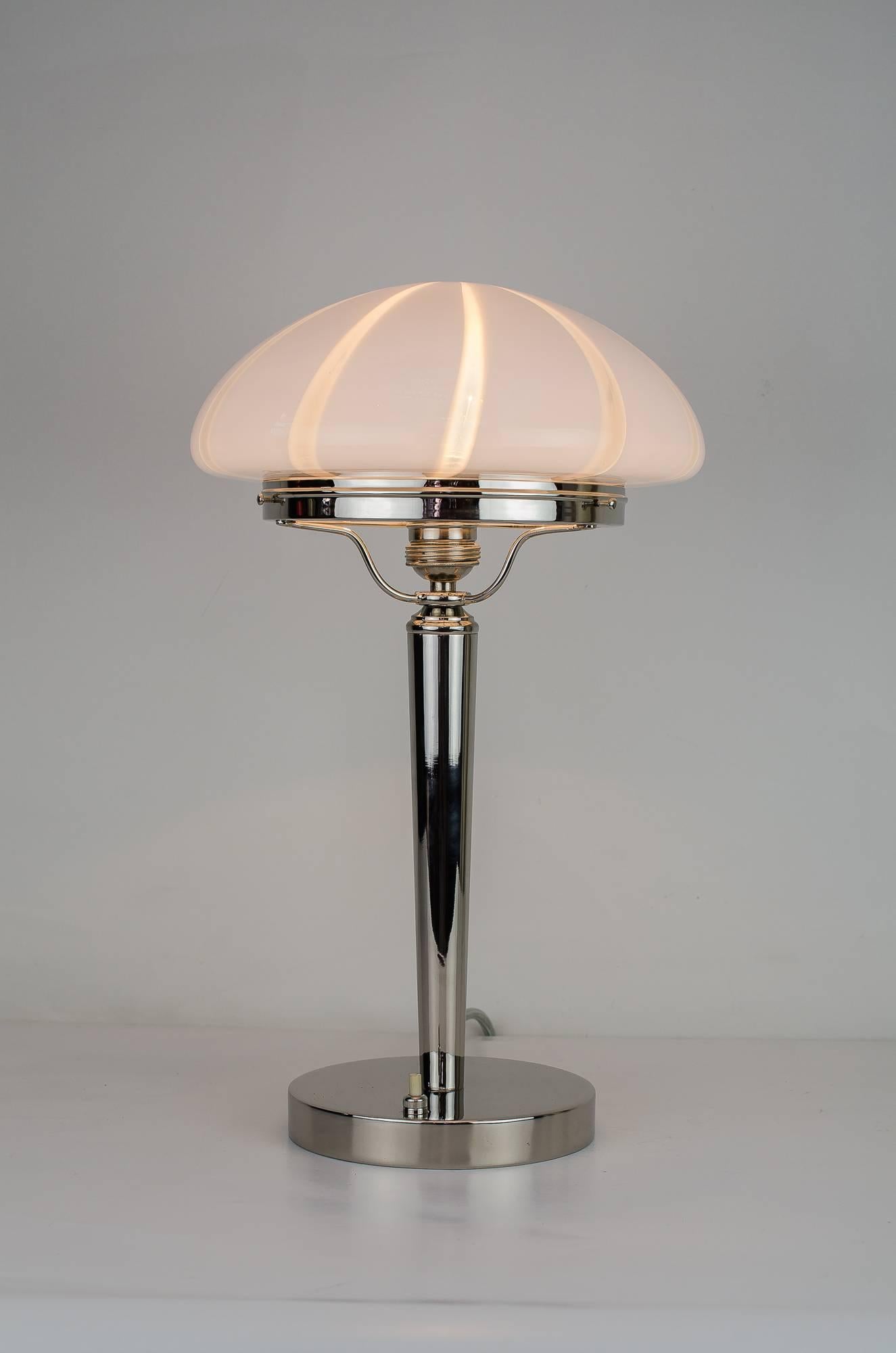 Art Deco table lamp, circa 1920s
Original glass shade
Nickel-plated.
 