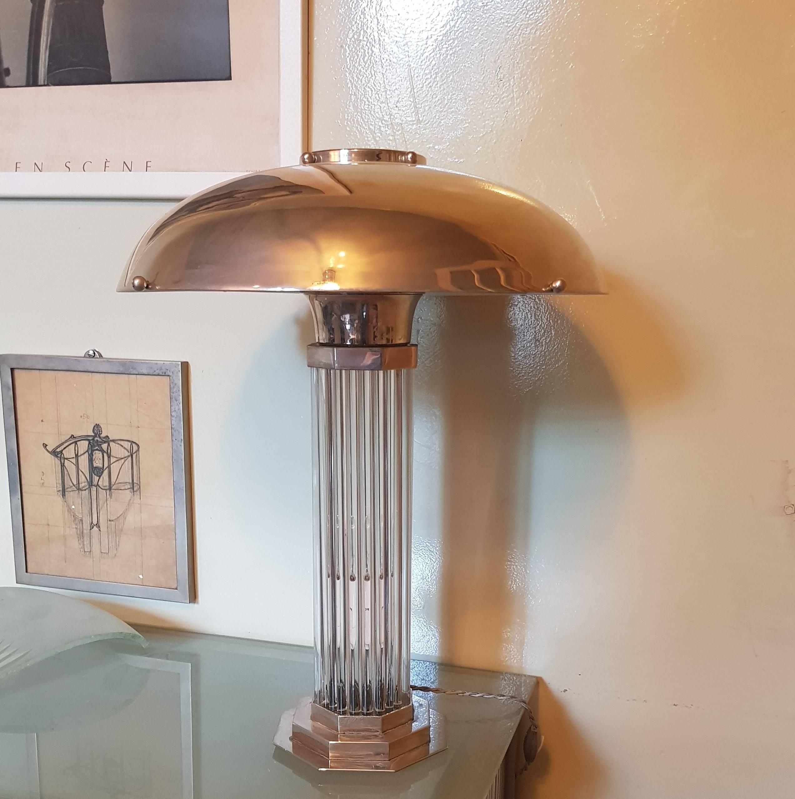 Art Deco table lamp with nickel finish and glass rods.