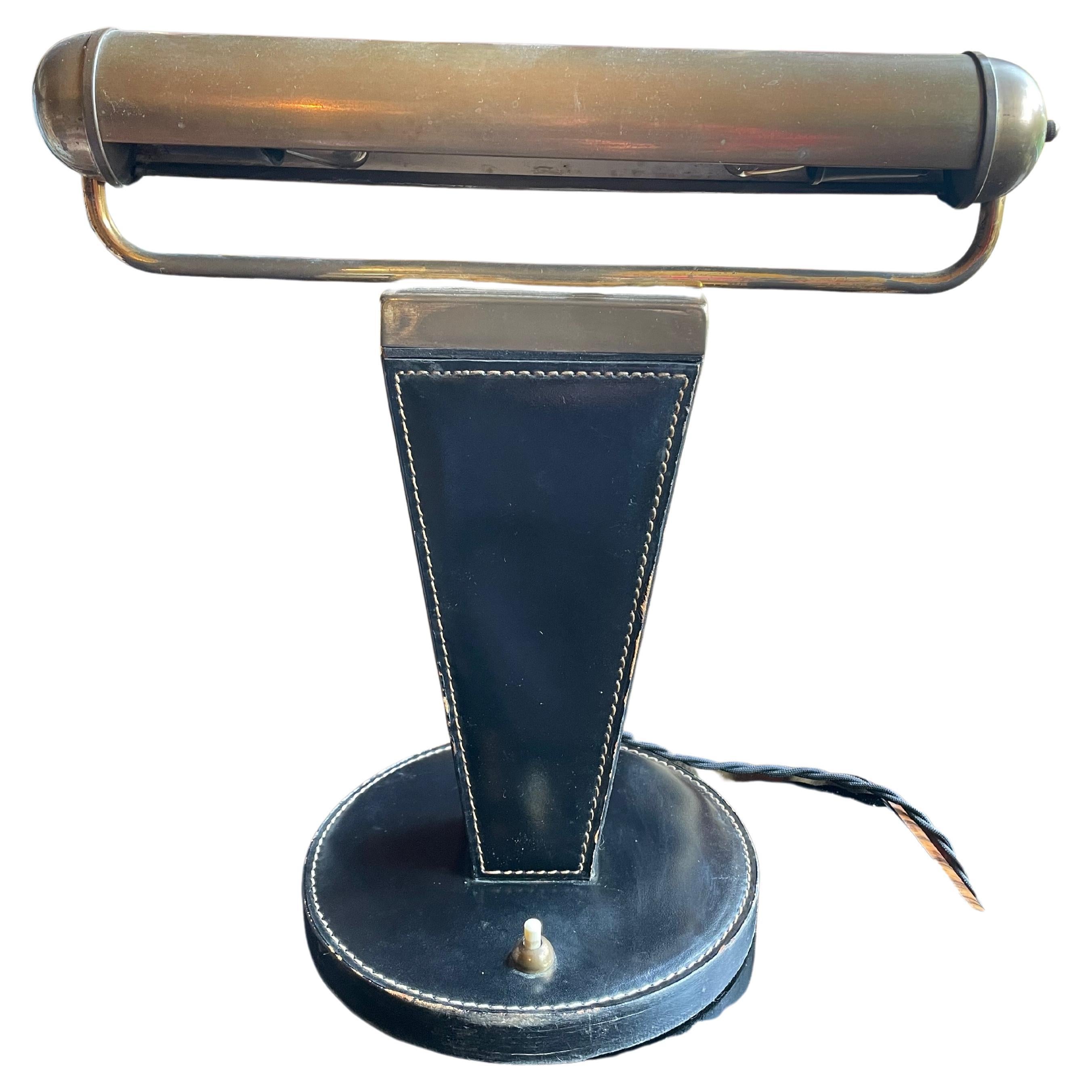 Art Déco table lamp. France 1940s. Jacques Adnet. Stiched Leather , Brass. For Sale