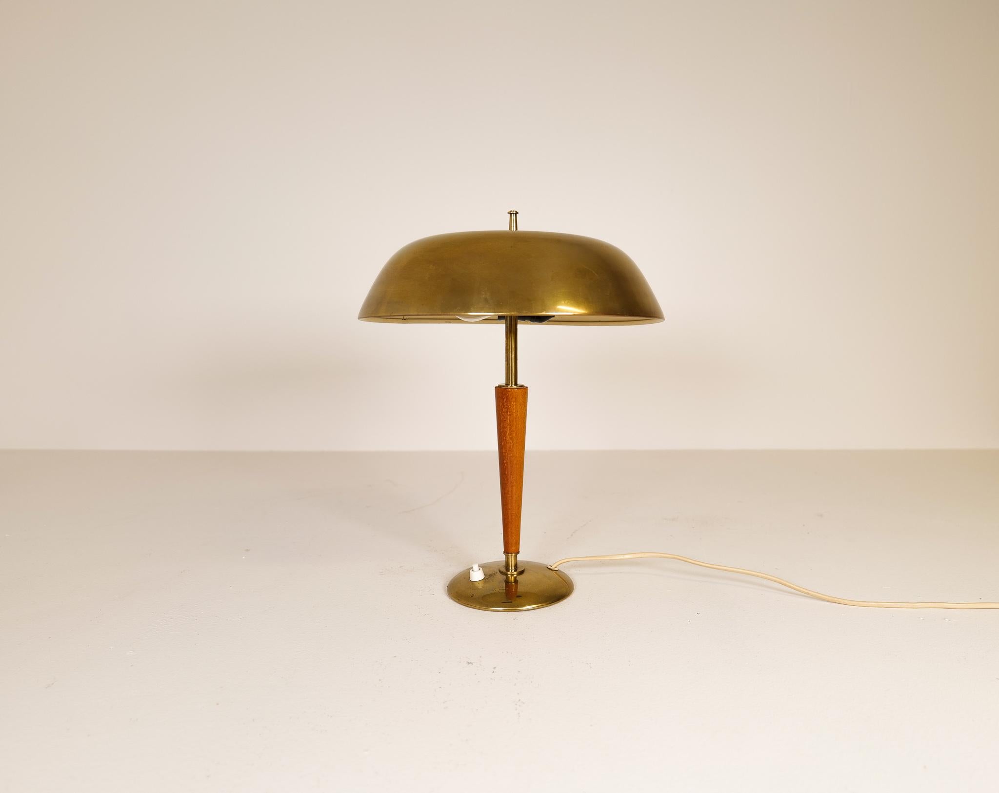 This table lamp produced in the late Art Deco period was created and manufactured at Nordiska Kompaniets factory in Sweden. The NK (Nordic Company) was the go-to store during this time, and their inventory was of high quality. This lamp made with a