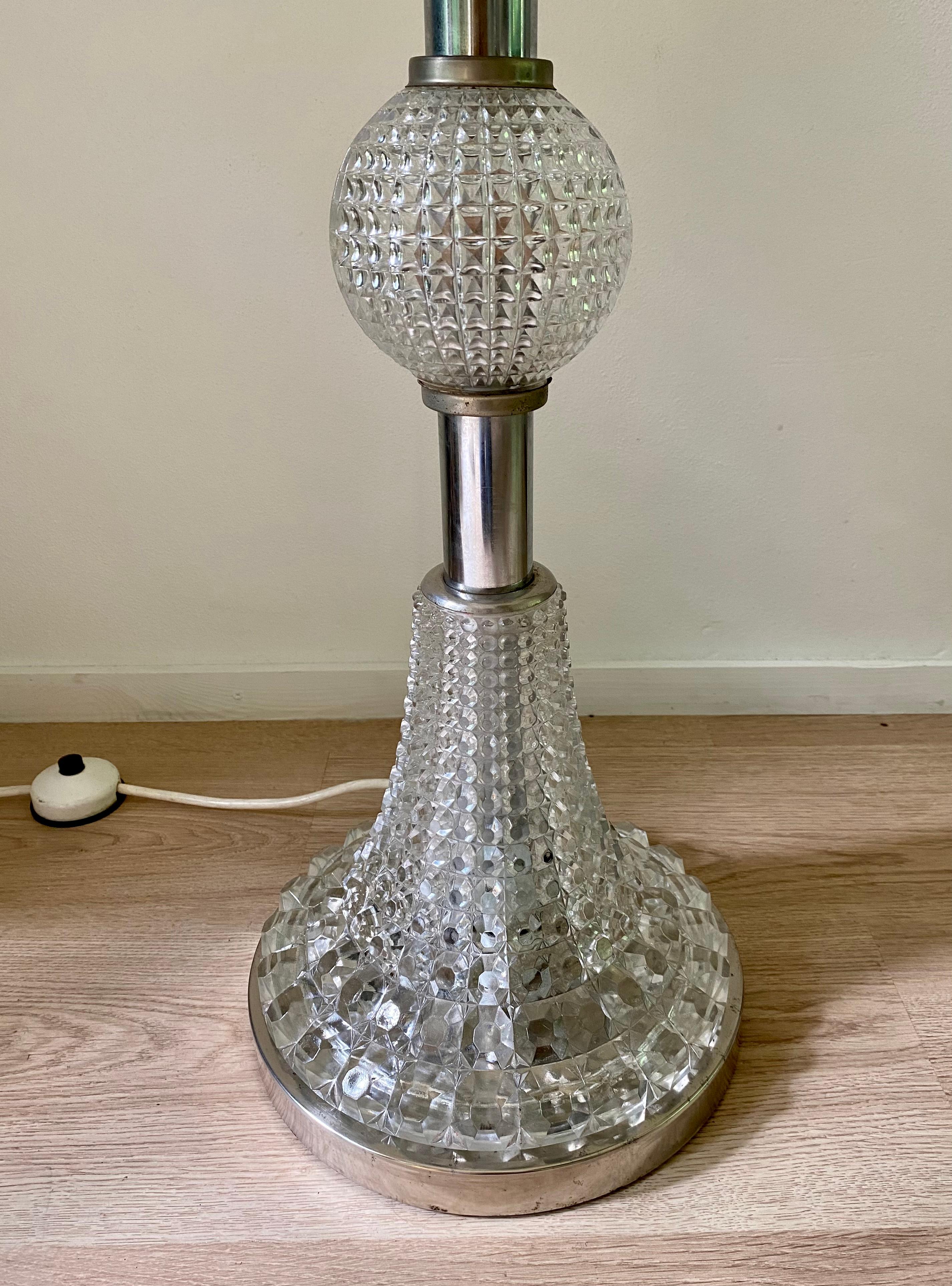 Wonderful European Lamp foot consisting of cut glass and Chrome. The lights inside can be switched on and off together or separately. Absolute stunning piece which is still in good condition for it’s age.