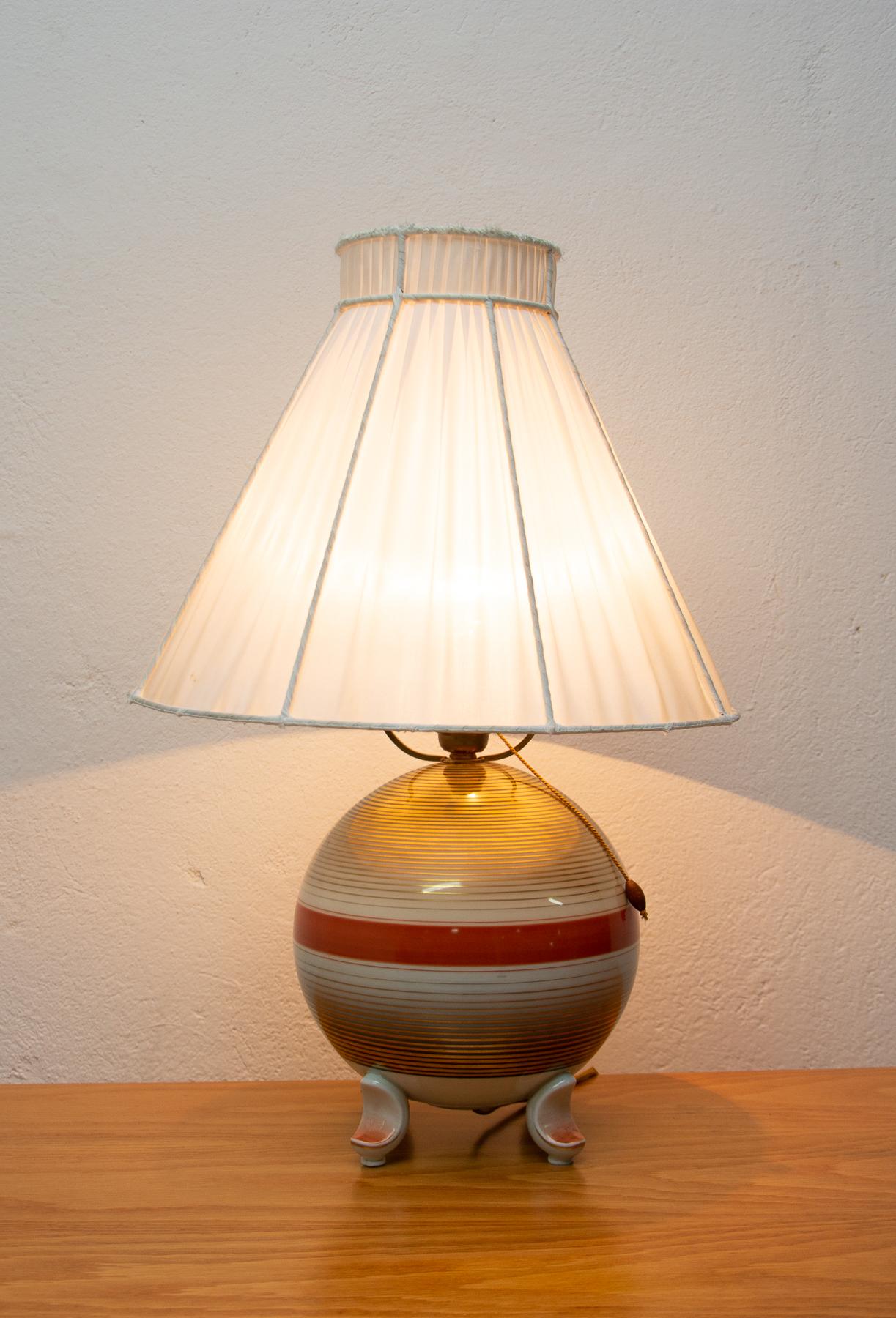 Porcelain Art Deco table lamp in the shape of a mushroom.
The lamp stands out for its extraordinary shapes typical of the Art Deco period. It was made by the famous Rosenthal company in the 1930´s.
Overall, it is in very good condition, has a new