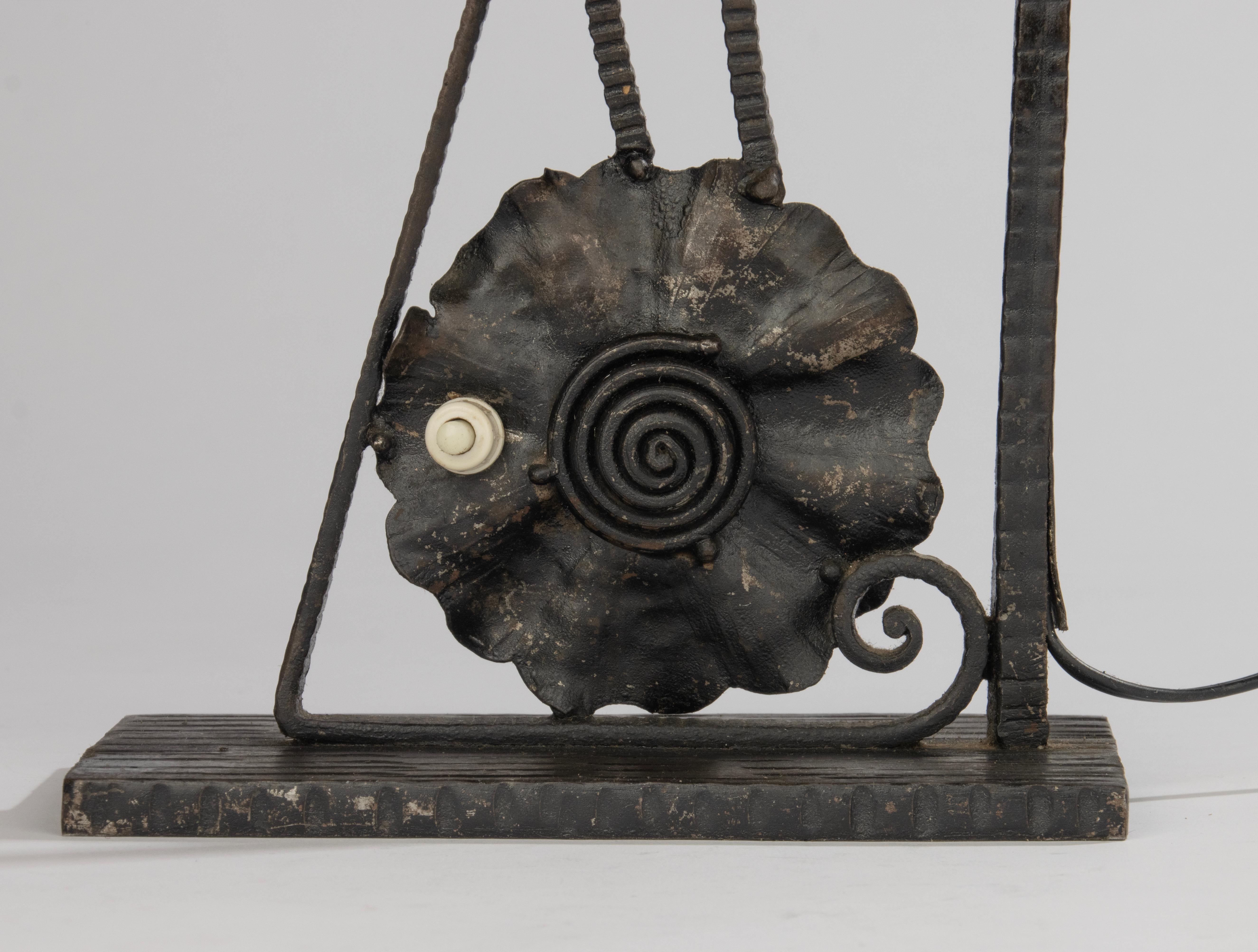 A rare and original Art Deco table lamp, dating from the period, created in collaboration between Schneider and Carion. The glass lampshade is signed Schneider and the wrought iron base is stamped Carion. These two renowned makers frequently worked