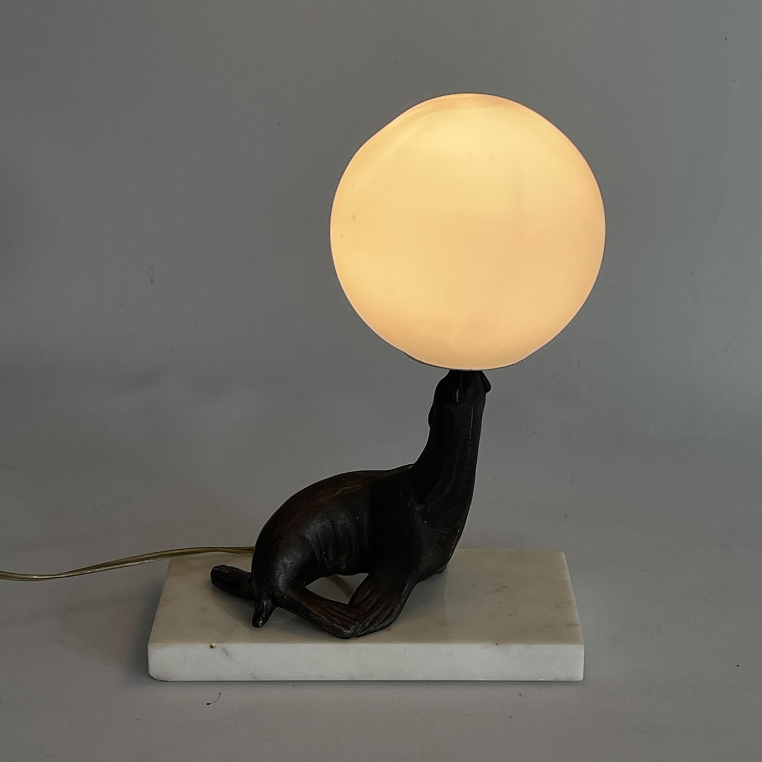 Metal ART DECO table lamp seal sea lion sculpture lamp marble, 1930s For Sale