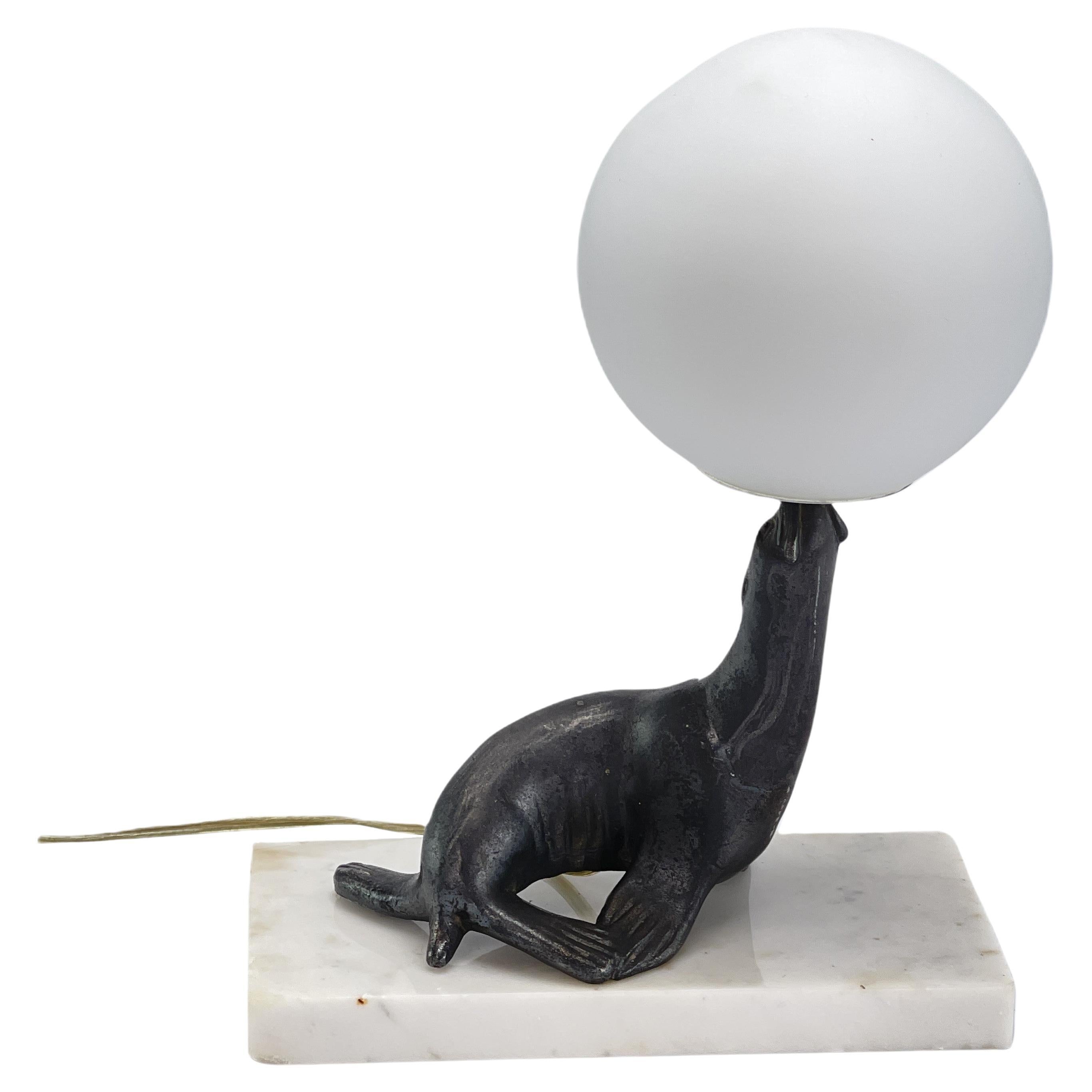 Lámpara de sobremesa ART DECO foca león marino escultura lámpara mármol, años 30