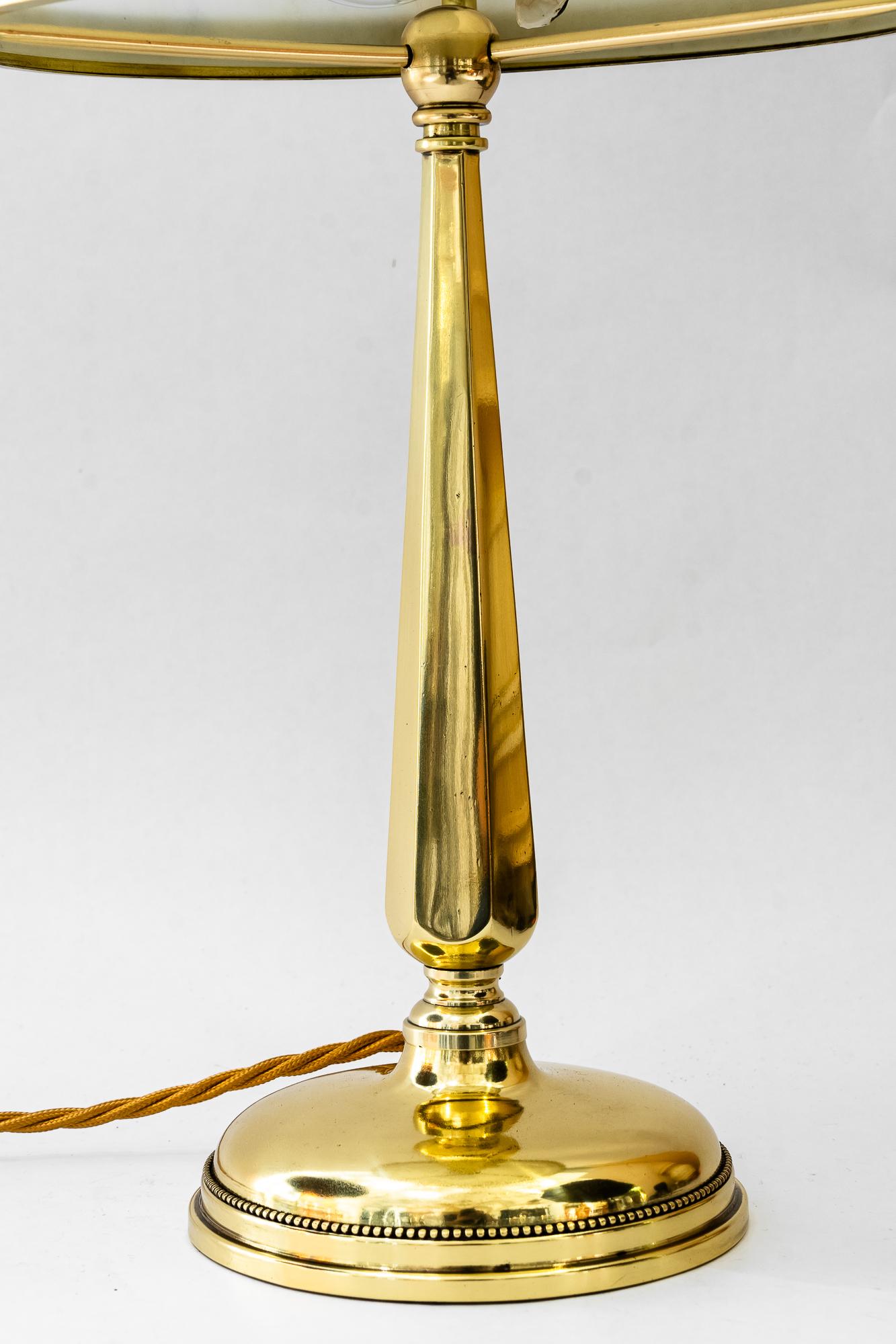Art Deco table lamp vienna around 1920s
Polished and stove enameled
Original antique glass shade