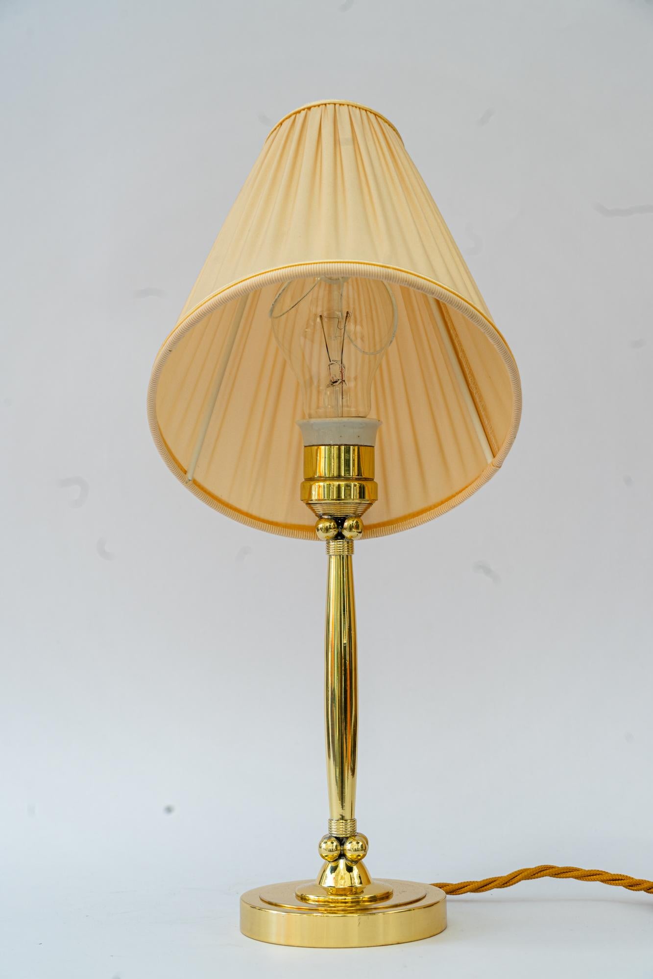 Lacquered Art Deco table lamp vienna around 1920s with fabric shade For Sale