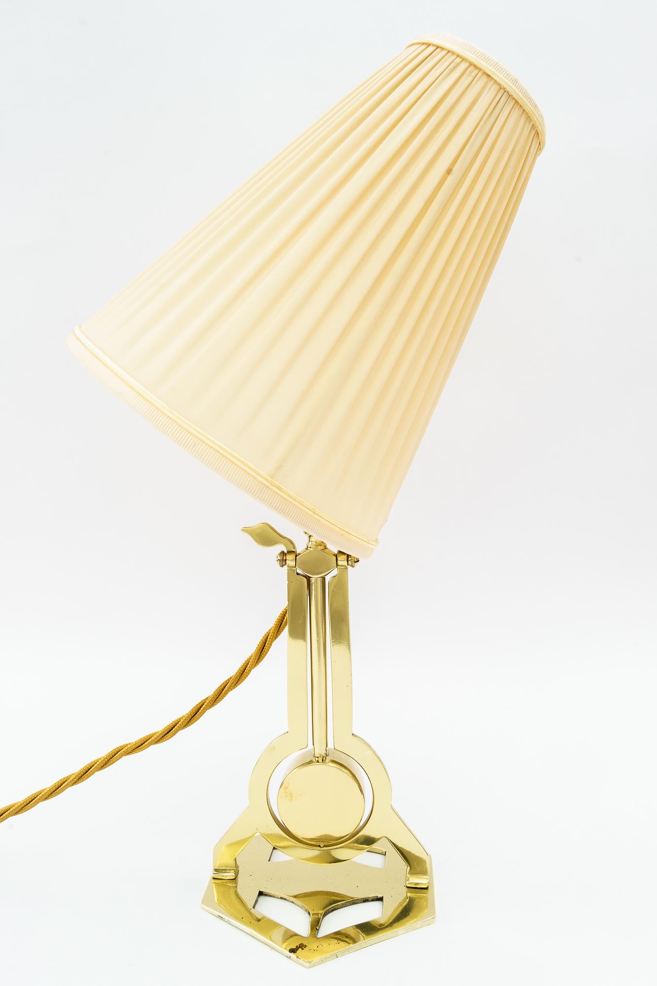 Lacquered Art Deco table lamp vienna with fabric shade around 1920s  For Sale