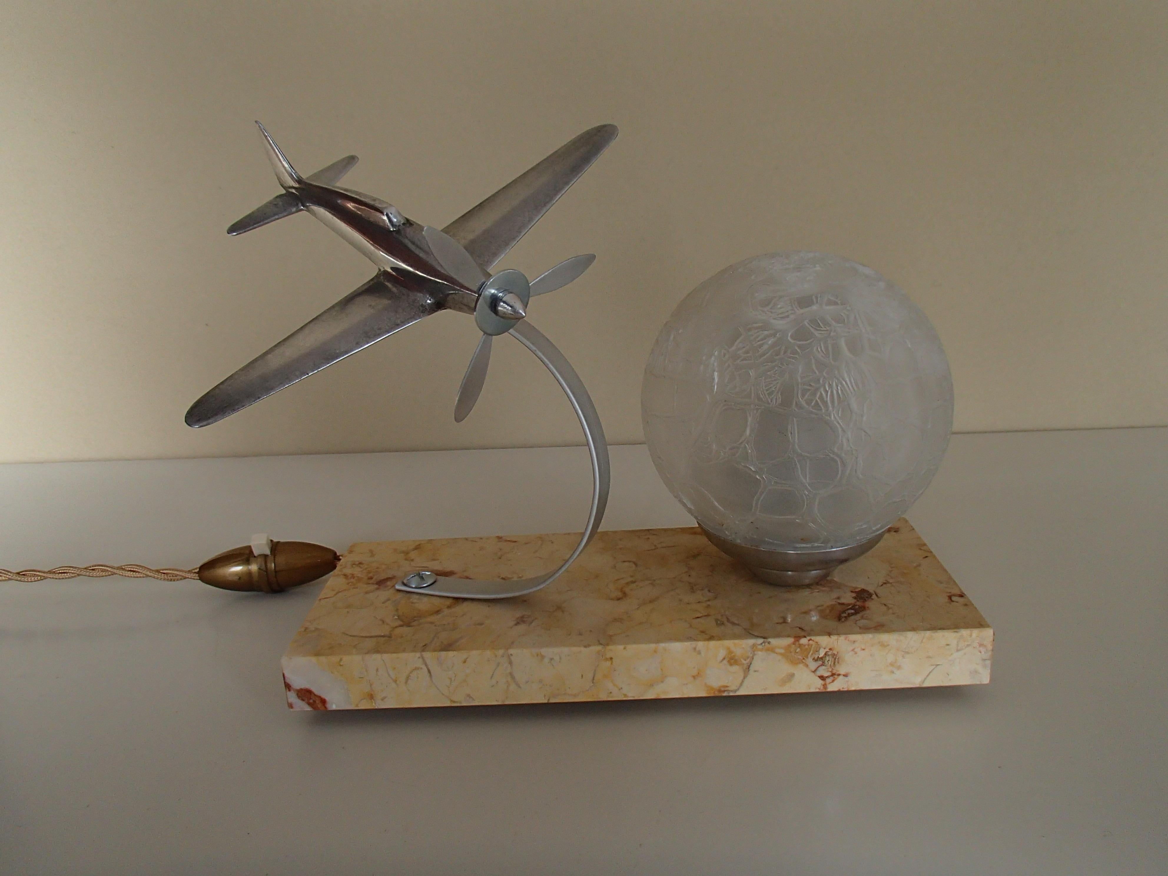 Art Deco table lamp with aeroplain.