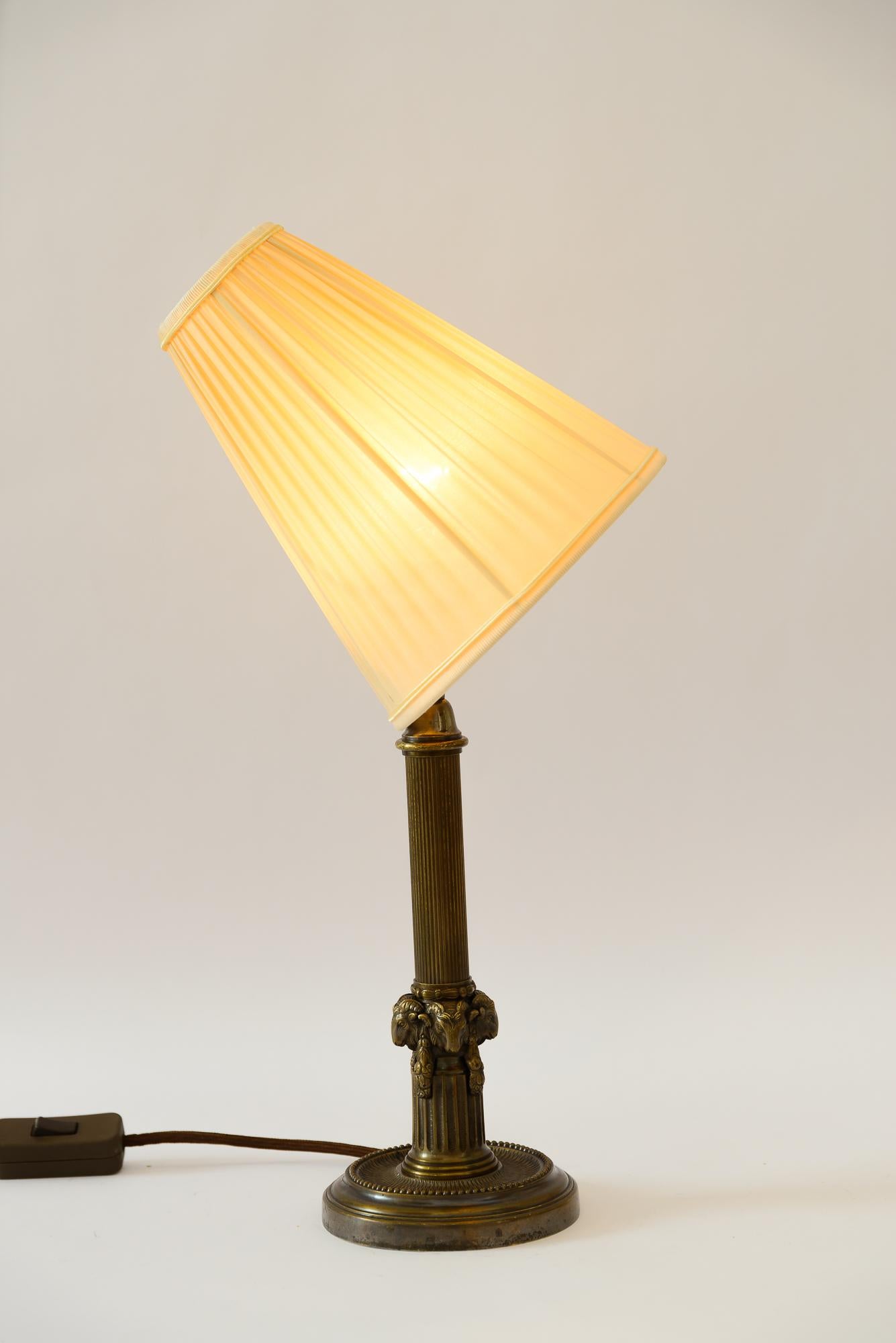 Art Deco Table lamp with capricorn head with fabric shade vienna around 1920s For Sale 3