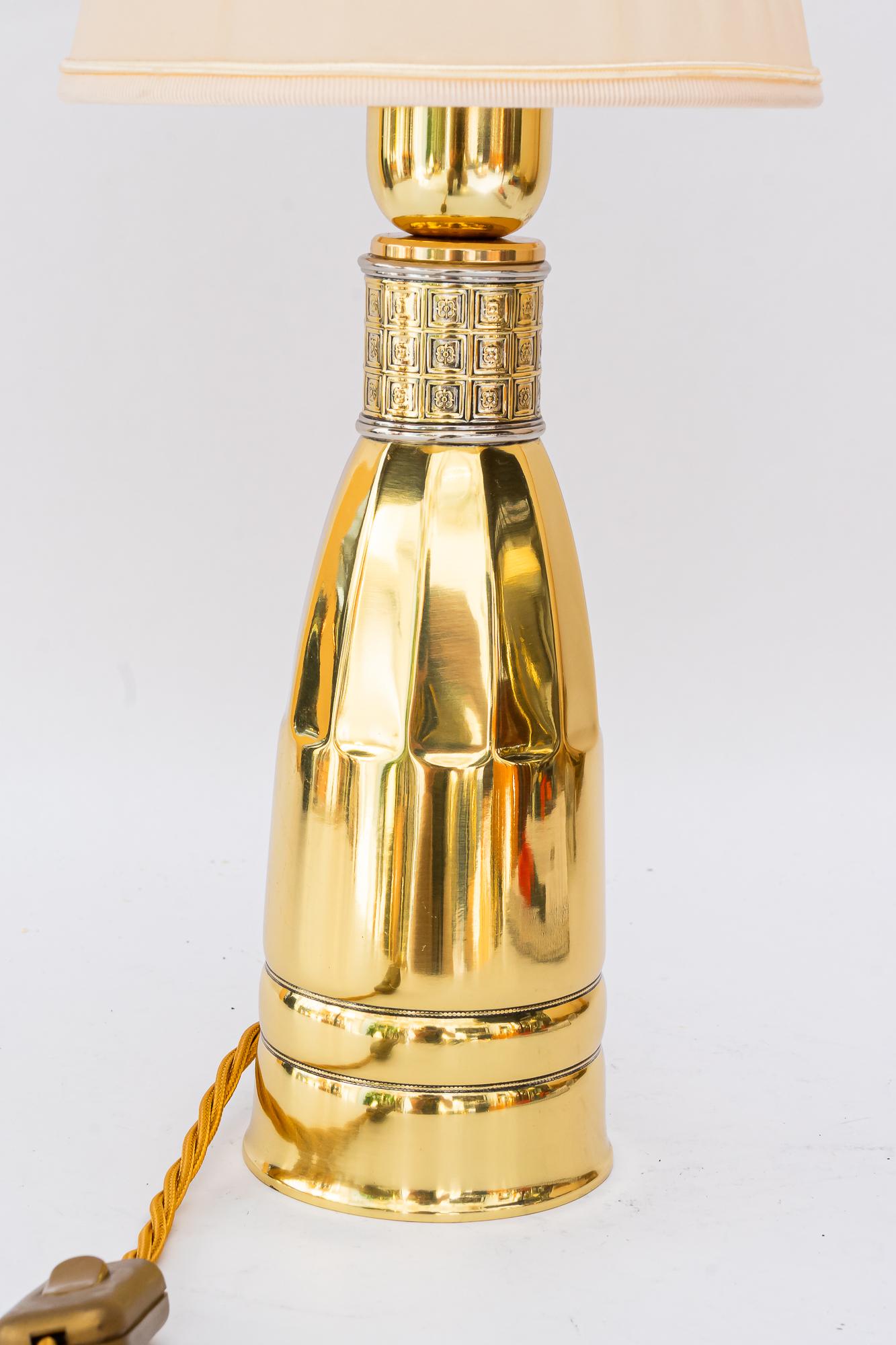 Art Deco Table lamp with fabric shade vienna around 1920s
Brass polished and stove enameled
Fabric shade is replaced ( new )