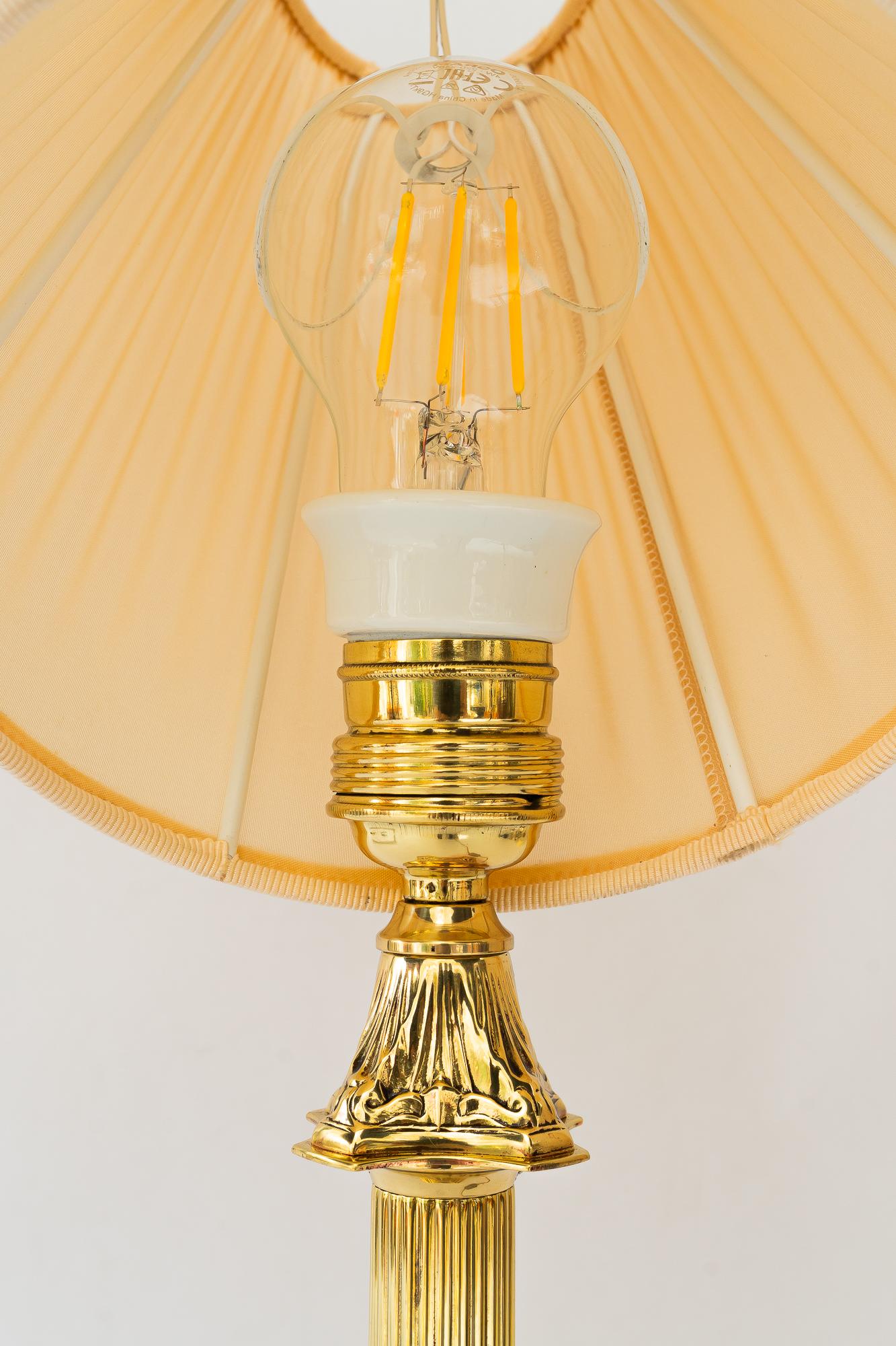 Lacquered Art Deco table lamp with fabric shade vienna around 1920s For Sale