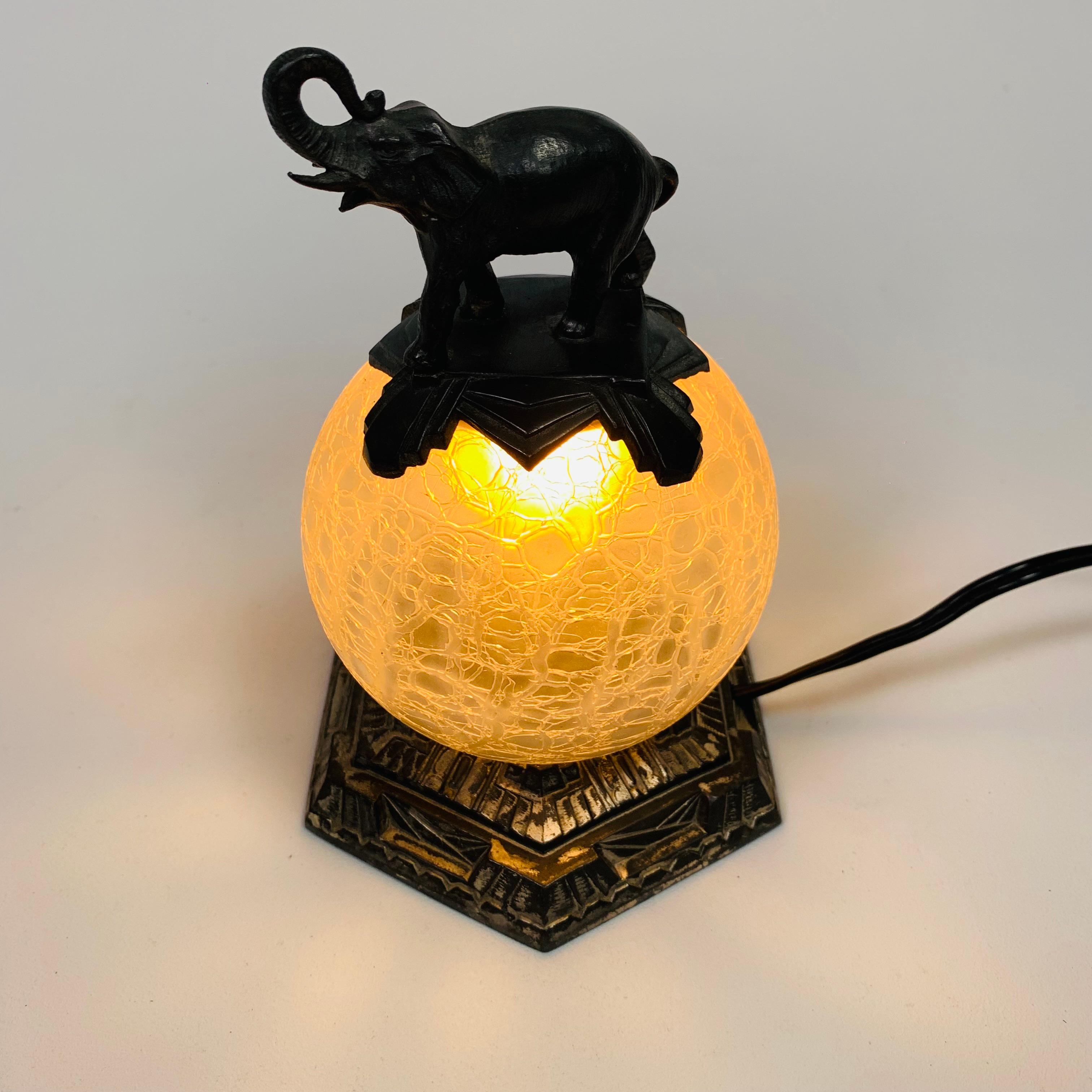 Art Deco table lamp with glass ball and elephant on top, 1930s 12