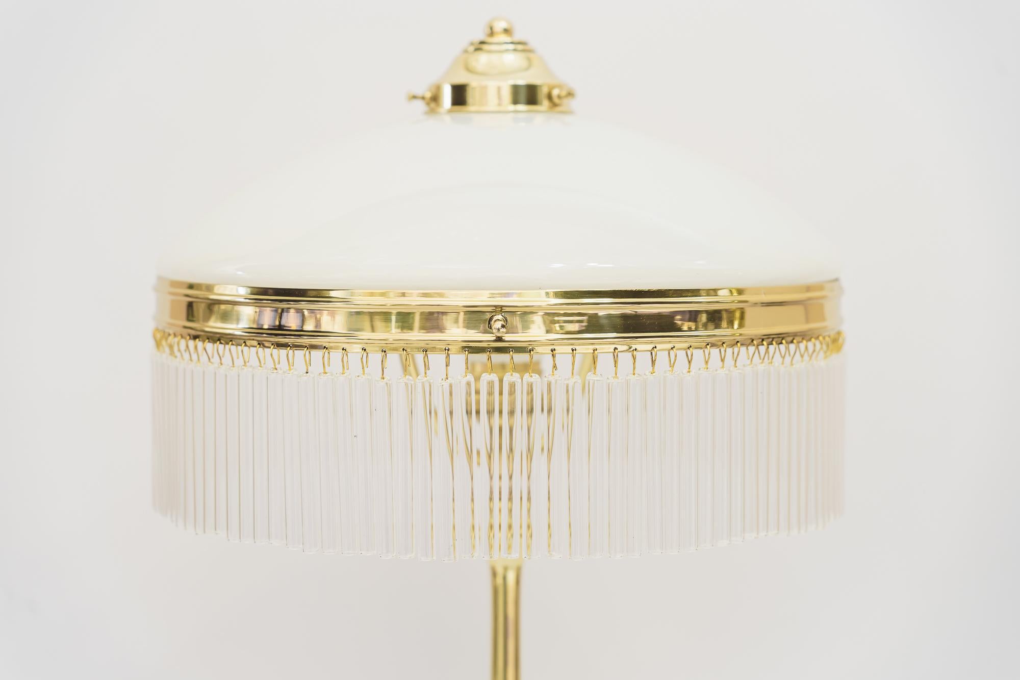 Art Deco table lamp with glass shade and glass sticks vienna around 1920s
Polished and stove enameled
the glass sticks are replaced ( new )