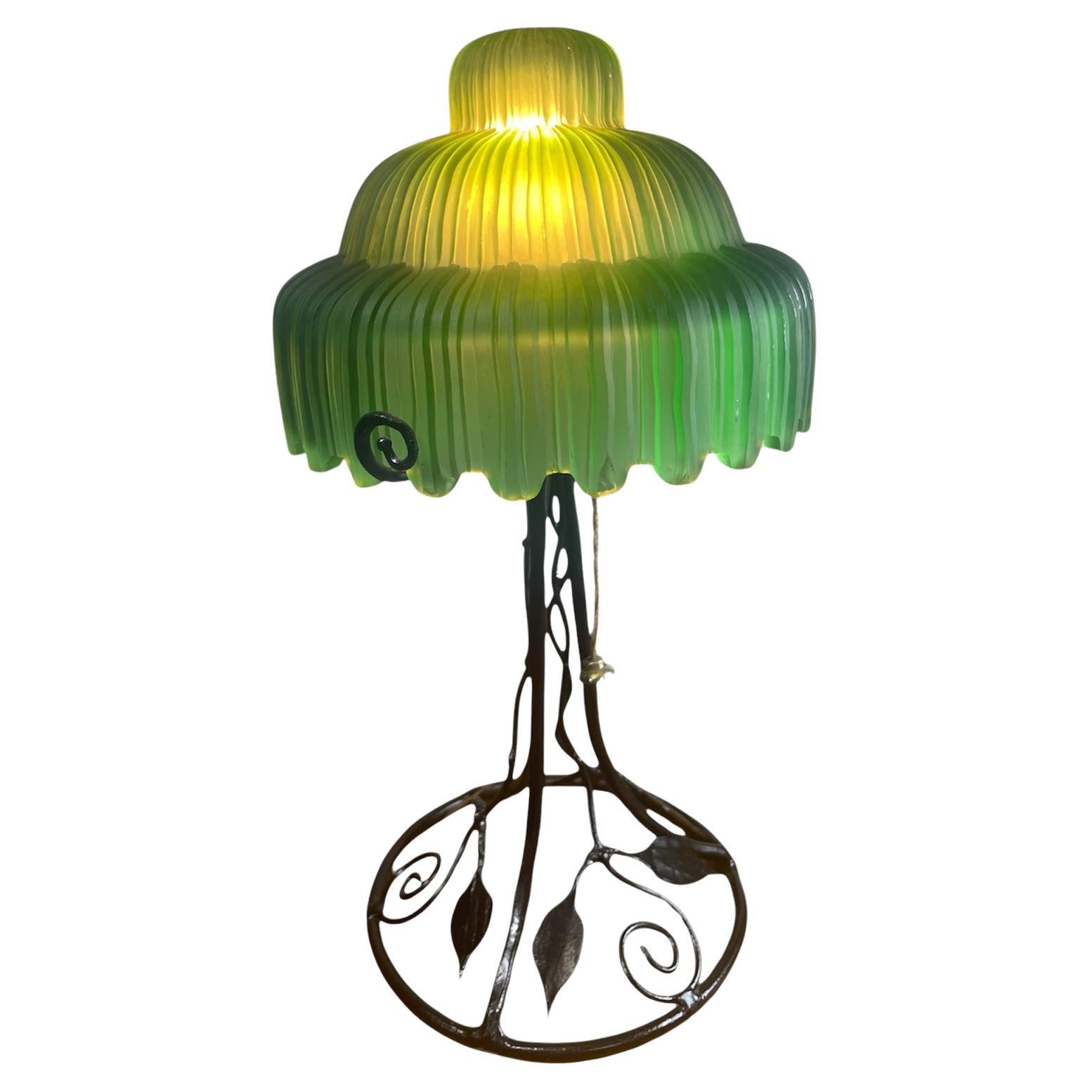 Art Deco Table lamp with green glass shade and iron base