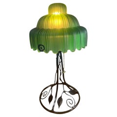 Art Deco Table lamp with green glass shade and iron base