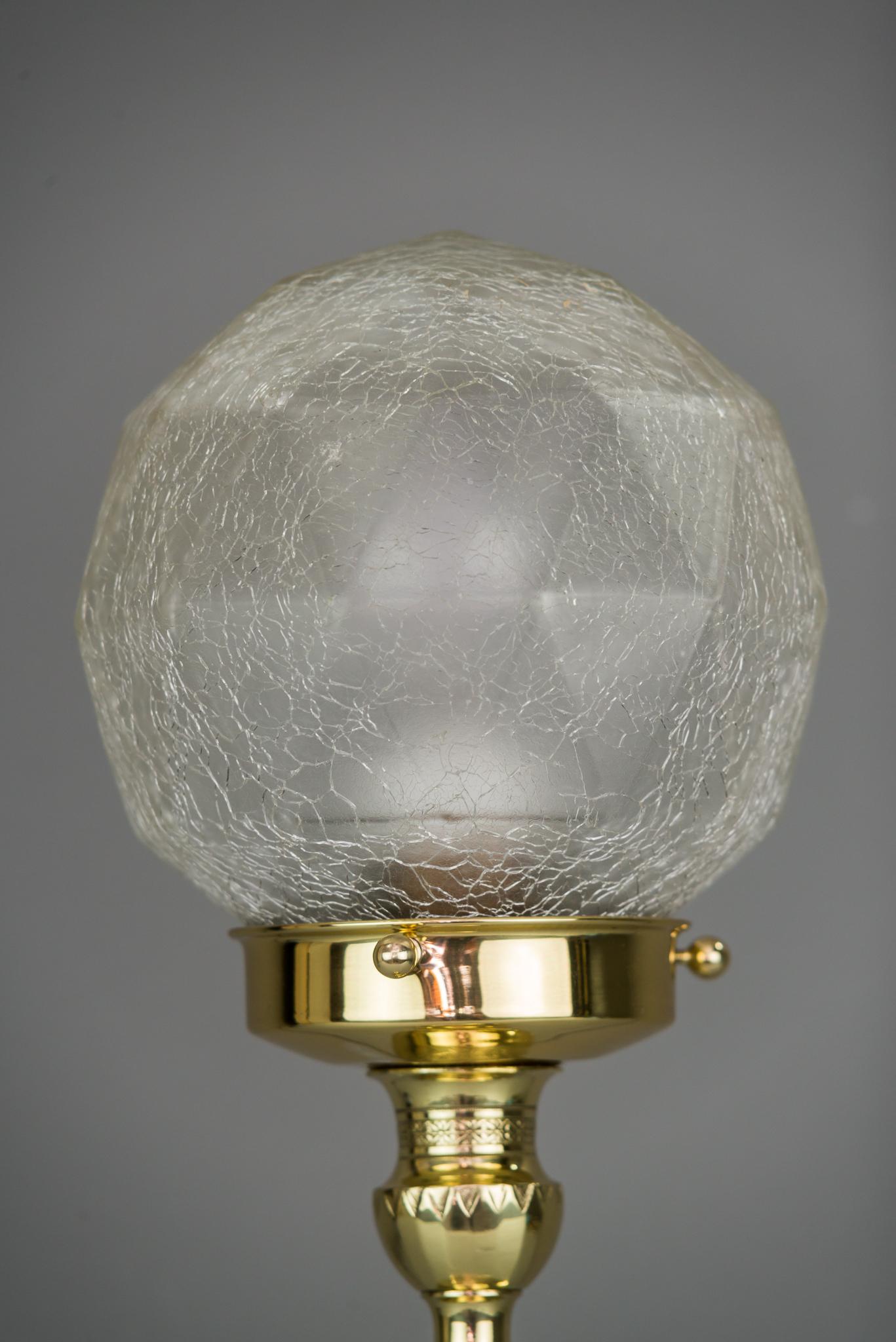Art Deco table lamp with original glass shade, circa 1920s
Polished and stove enameled.