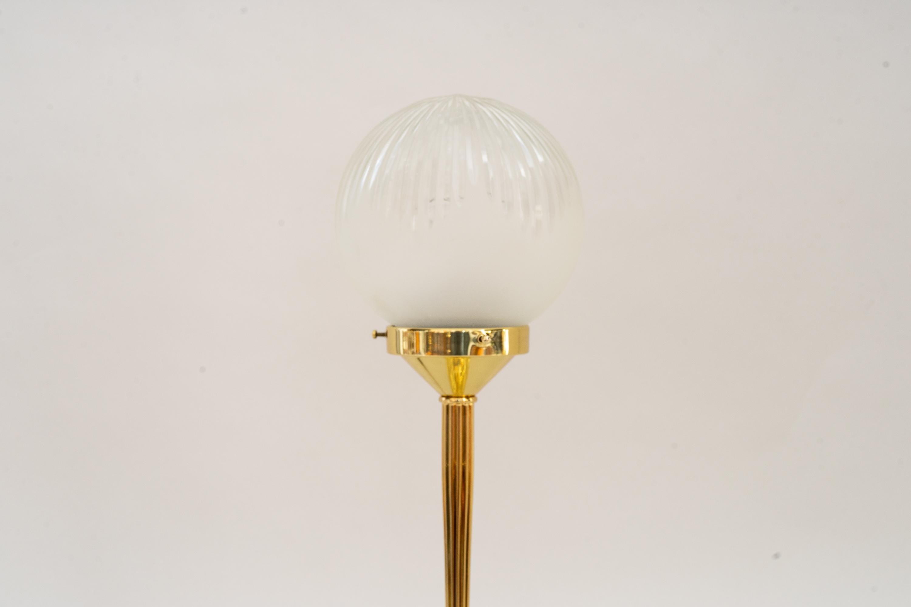 Art Deco Table lamp with original glass shade around 1920s
Polished and stove enamelled
Original glass shade.