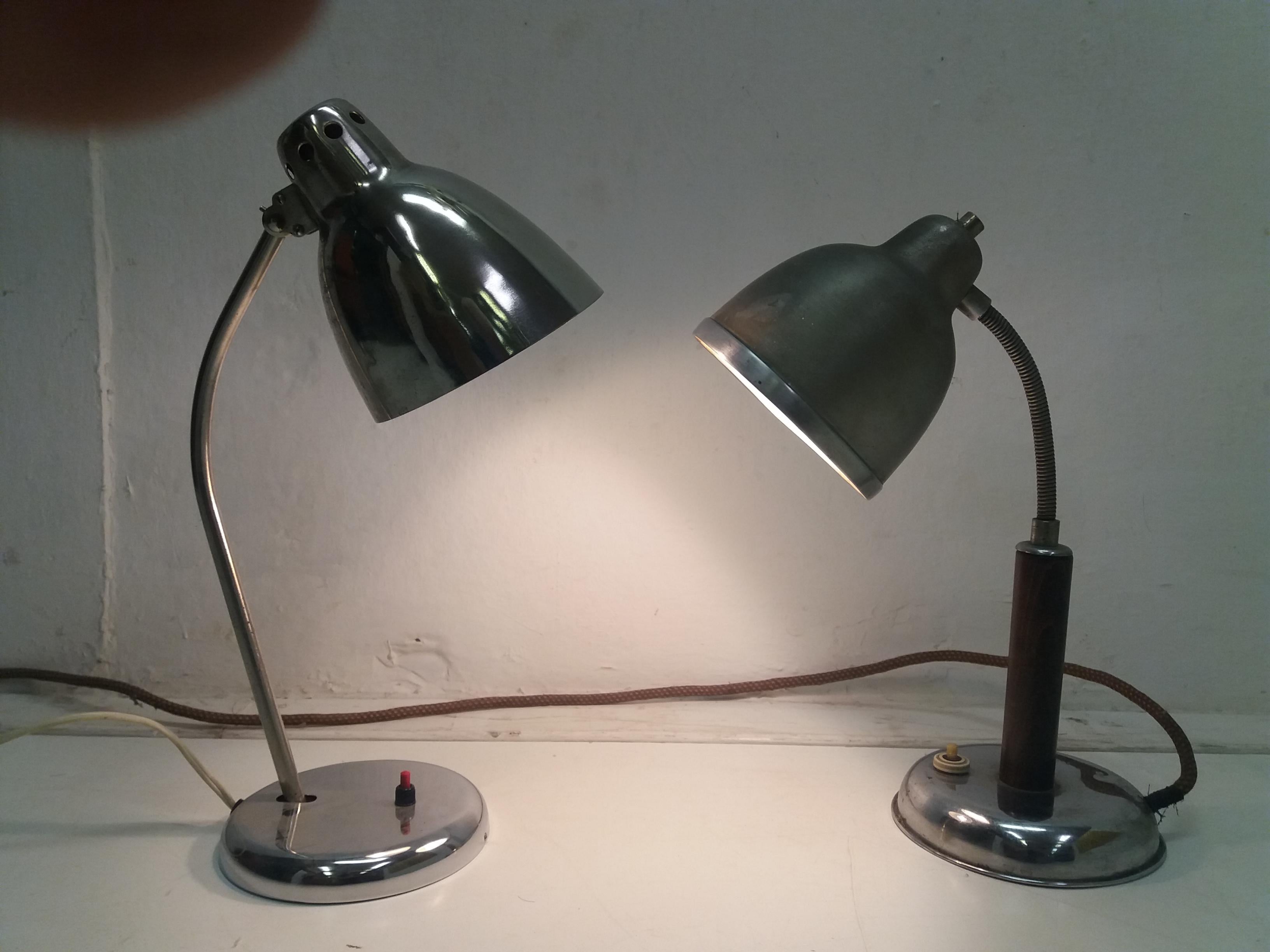 - Made in Czechoslovakia
- Made of metal, chrome and wood
- 1. lamp: all chrome, adjustable, 1935
Dimension: H 51 x W 25 x D 16
- 2.lamp: metal, wood, nykl, adjustable, 1940
Dimension: H 46 x W 25 x D 16
- Fully functional
- Good original