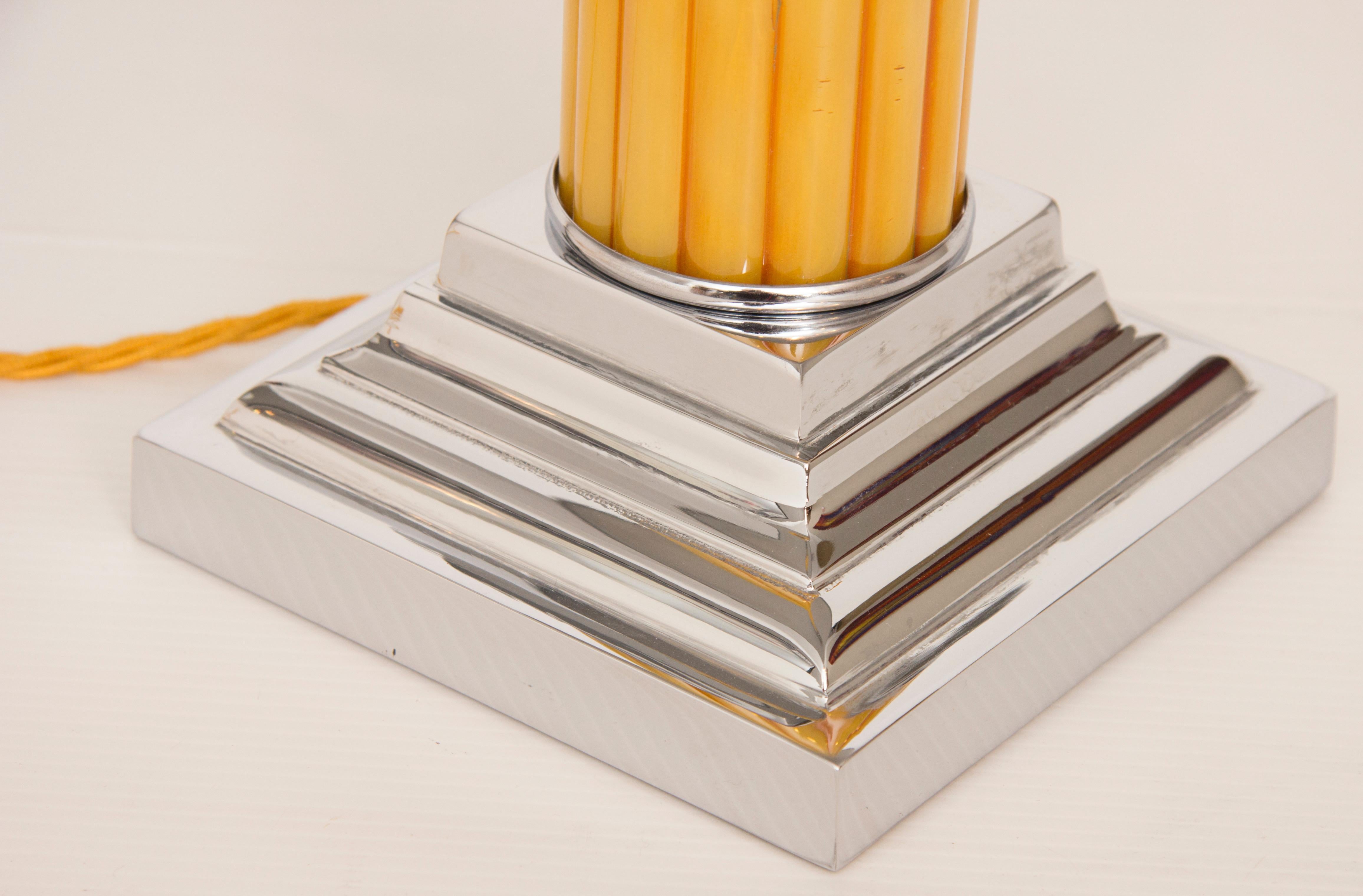 Art Deco desk or table.
A beautiful Art Deco desk or table lamp, the stepped chrome base with yellow phenolic ribbed column and chrome canopy shade with phenolic finial.
Measures: H 43 cm, W 37 cm, D 37 cm.
British, circa 1930.