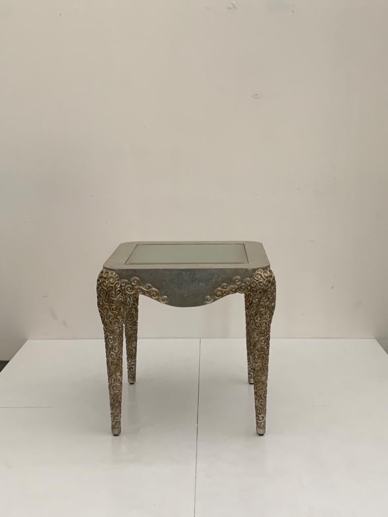 Silver leaf side table, resin-carved legs, and punched, polished, and back-treated glass top by Lam Lee, 1990s.
